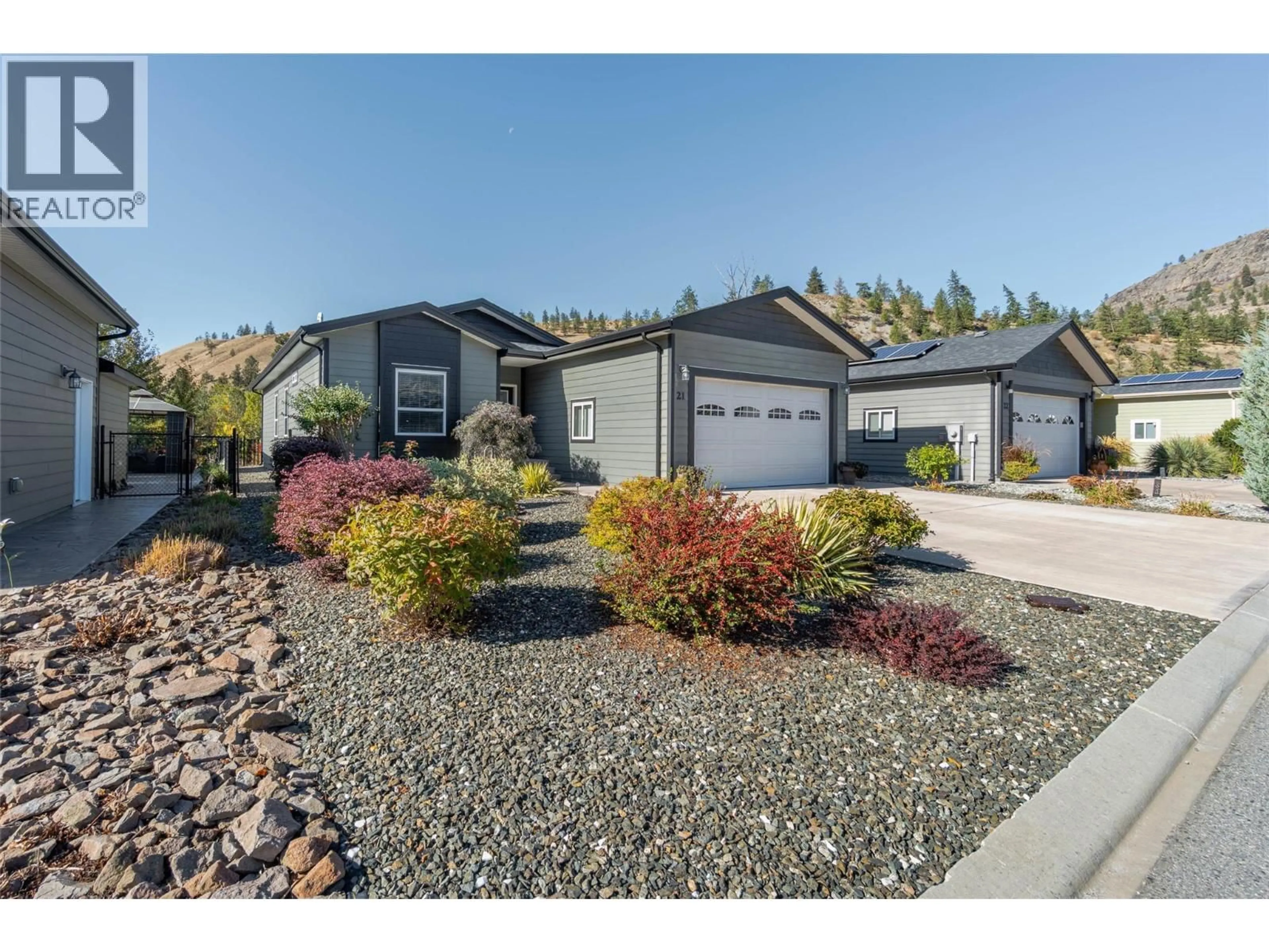 Home with vinyl exterior material, street for 21 - 8300 GALLAGHER LAKE FRONTAGE ROAD, Oliver British Columbia V0H1T2