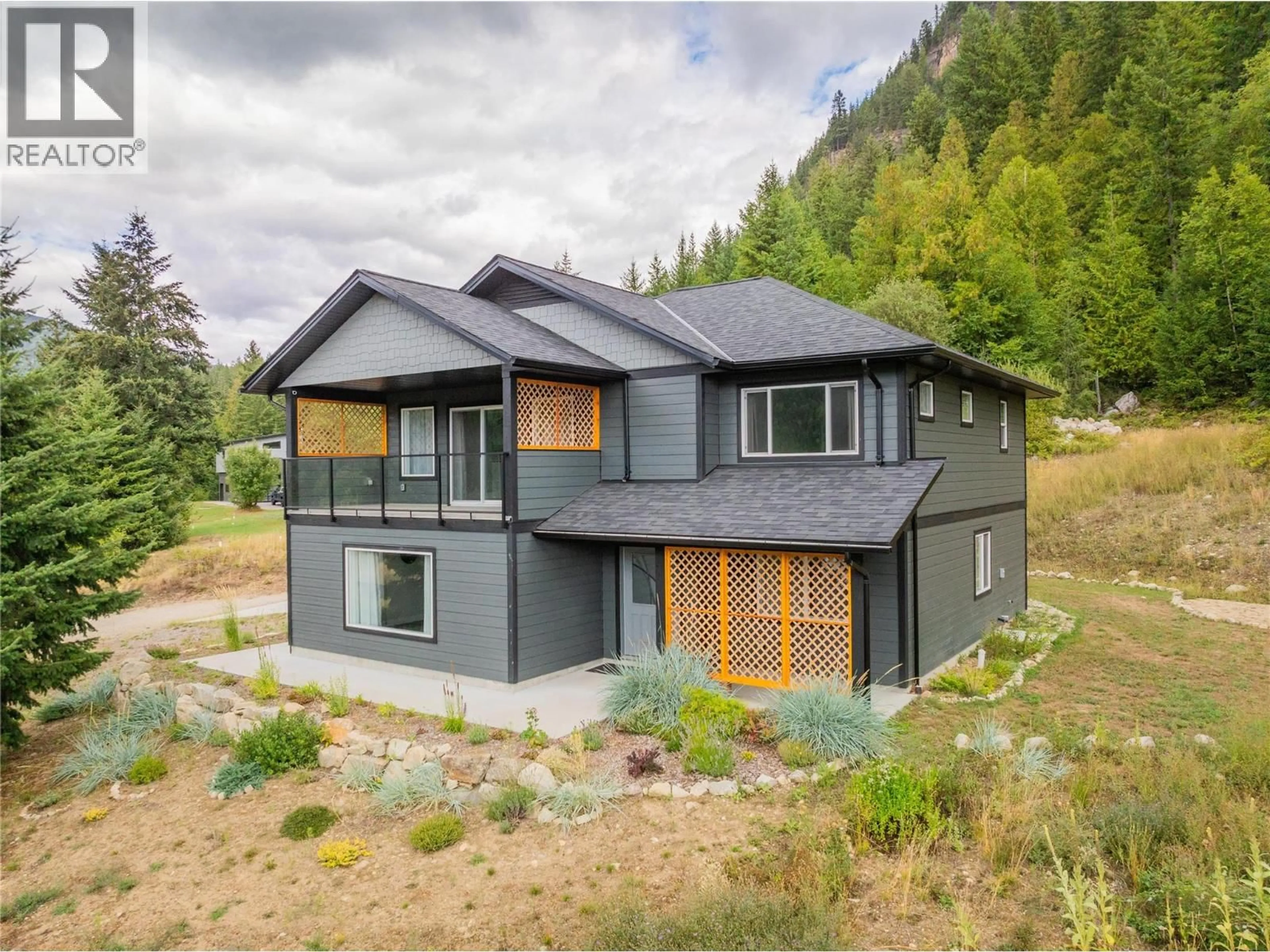 Home with vinyl exterior material, mountain view for 1955 SANDY ROAD, Castlegar British Columbia V1N4T1