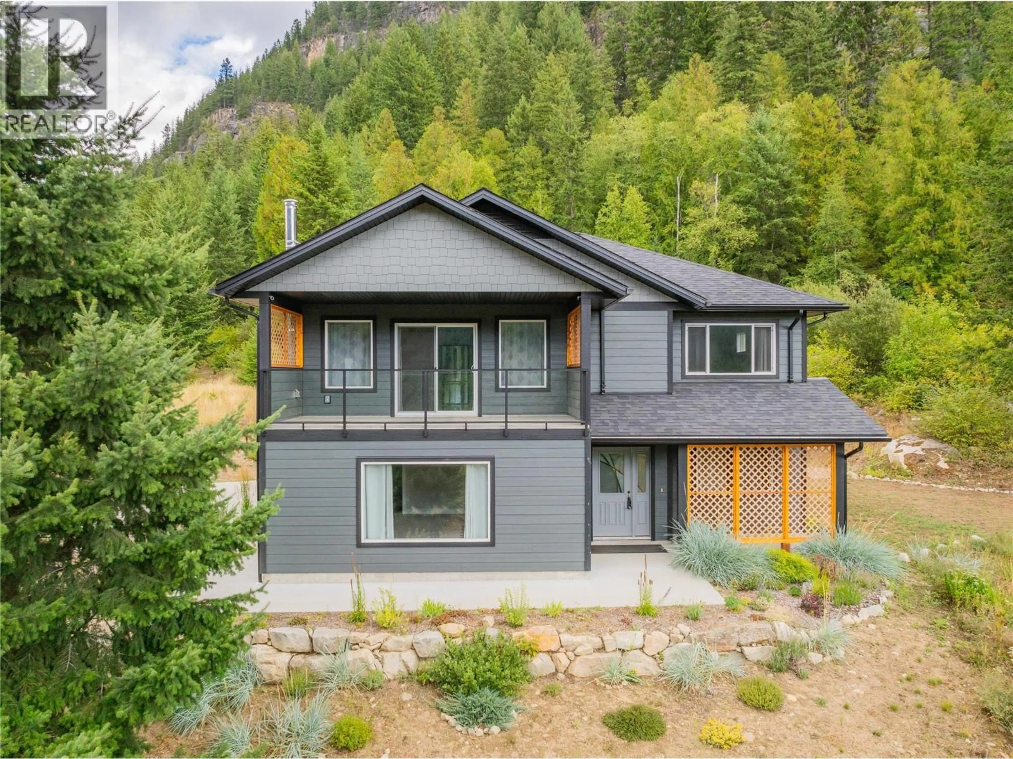 Home with vinyl exterior material, mountain view for 1955 SANDY ROAD, Castlegar British Columbia V1N4T1