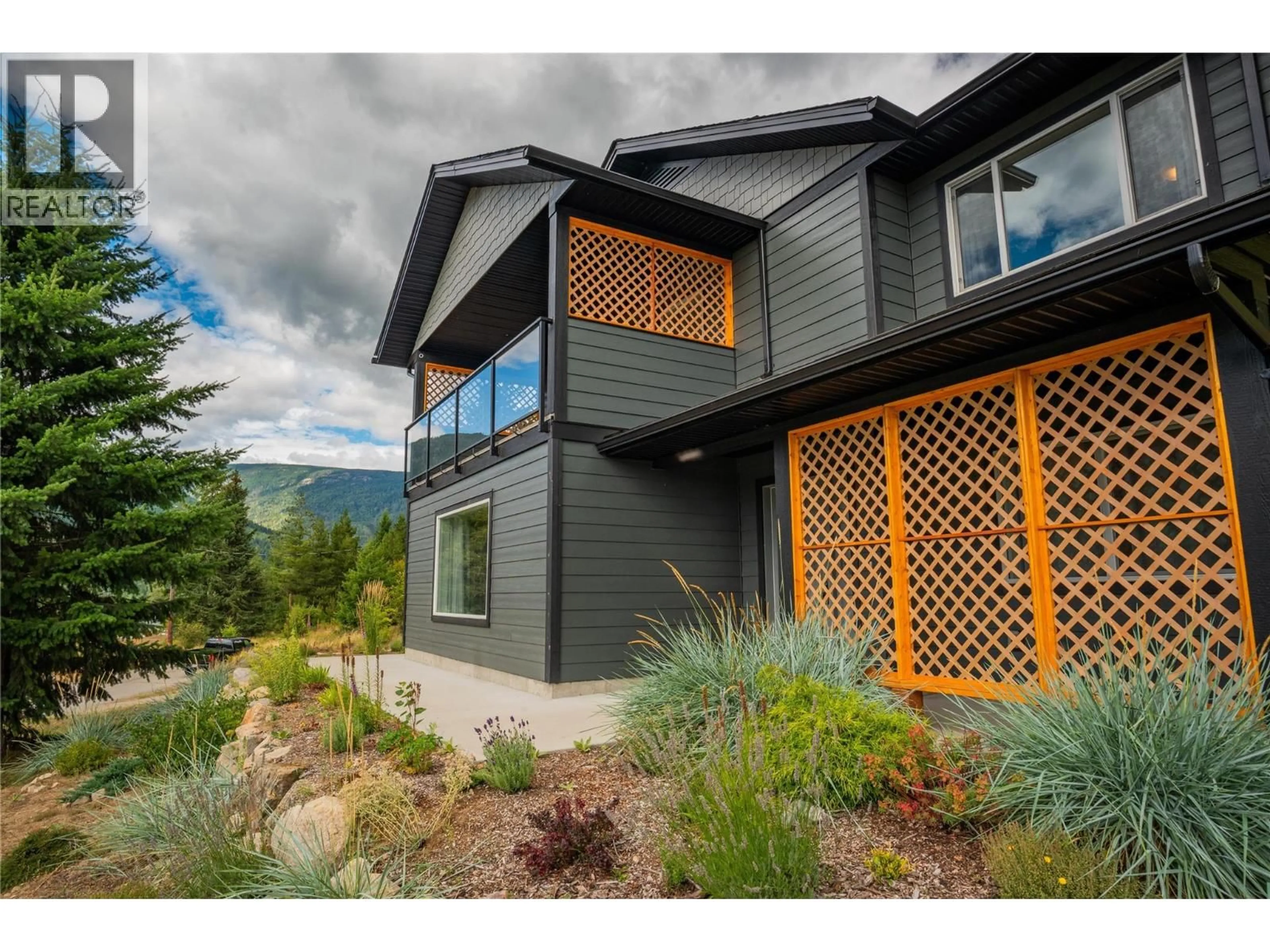Home with vinyl exterior material, mountain view for 1955 SANDY ROAD, Castlegar British Columbia V1N4T1