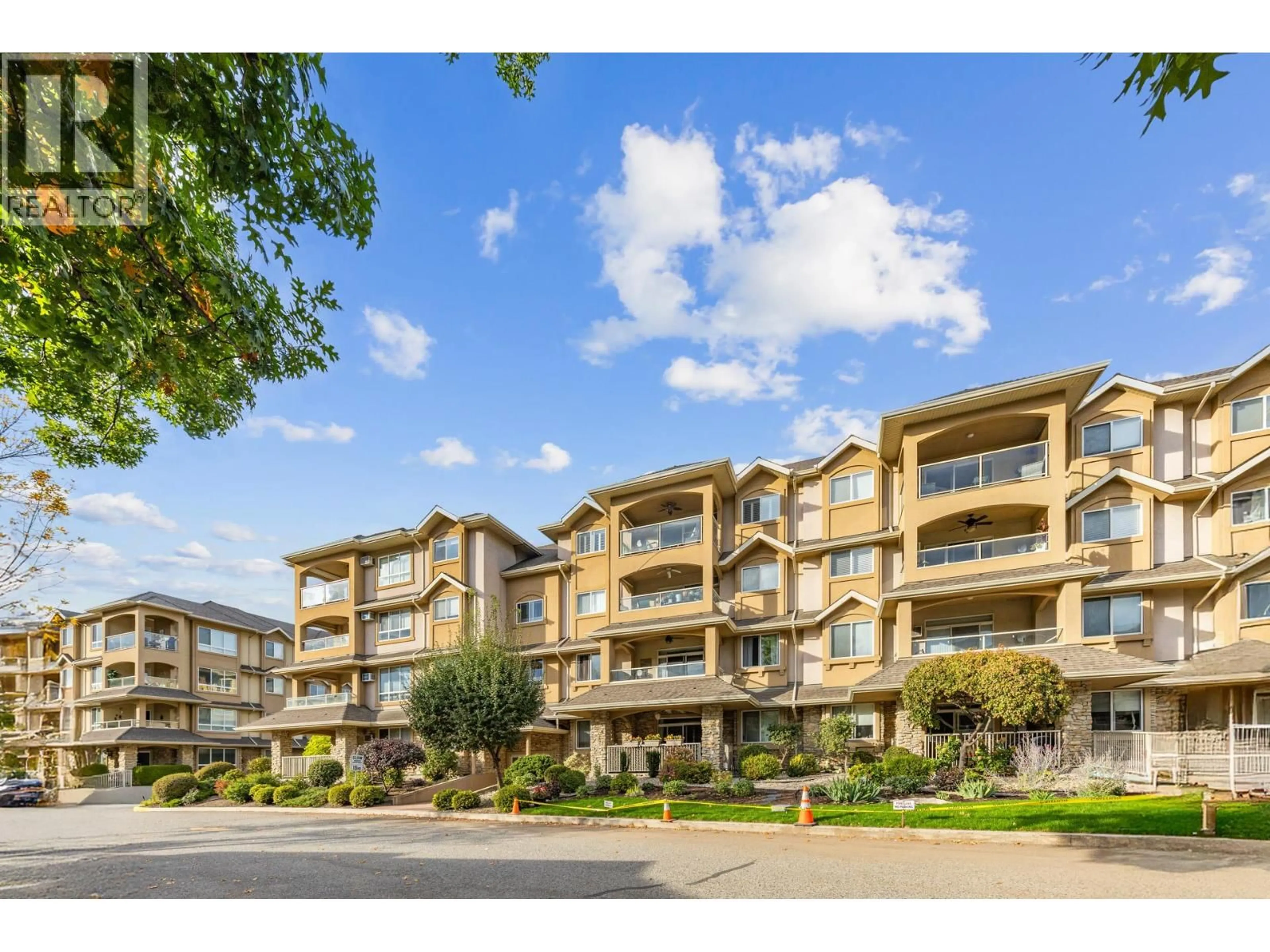 A pic from outside/outdoor area/front of a property/back of a property/a pic from drone, unknown for 403 - 1964 ENTERPRISE WAY, Kelowna British Columbia V1Y9S5