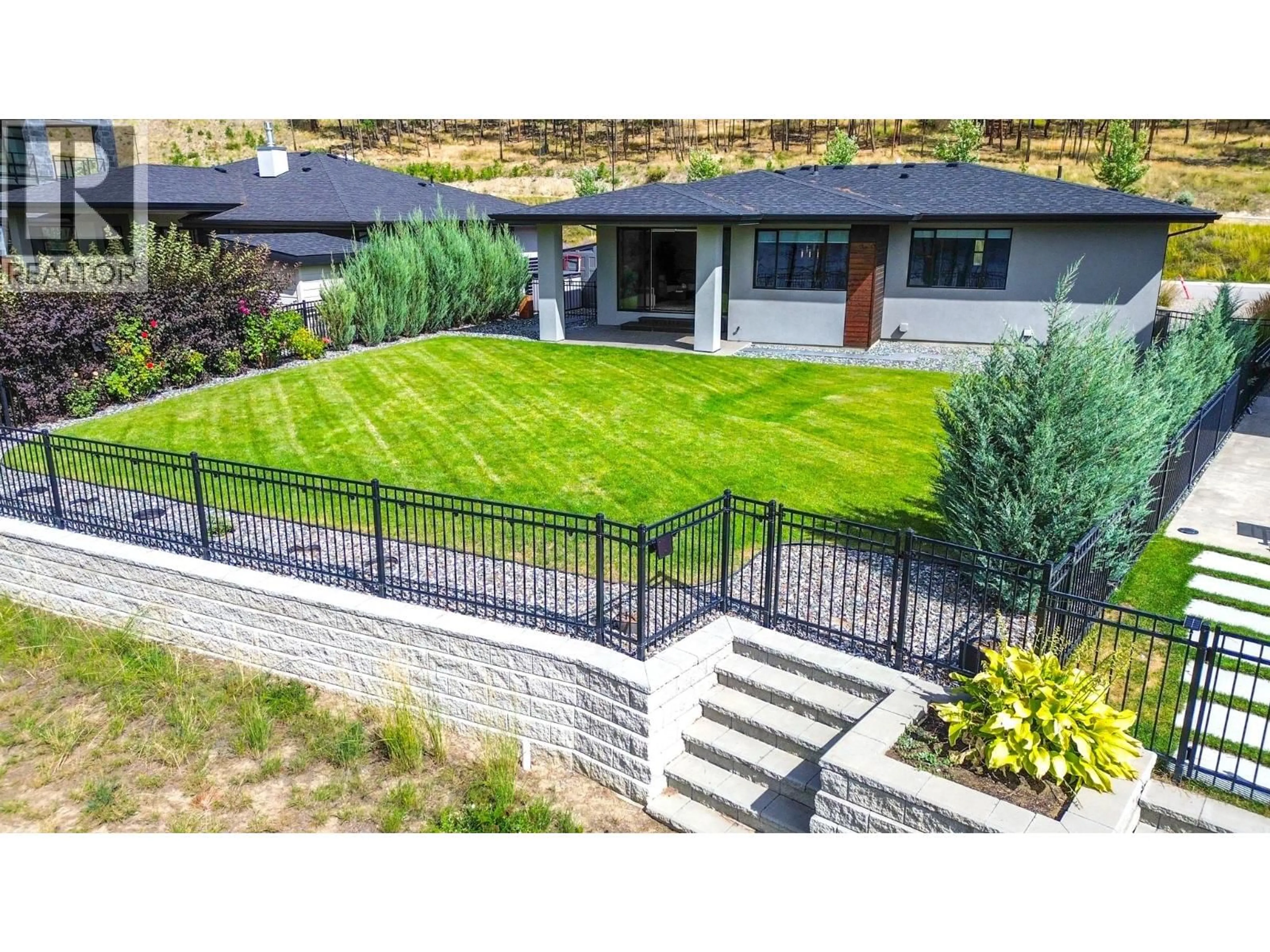 A pic from outside/outdoor area/front of a property/back of a property/a pic from drone, mountain view for 9592 BENCHLAND DRIVE, Lake Country British Columbia V4V0A4