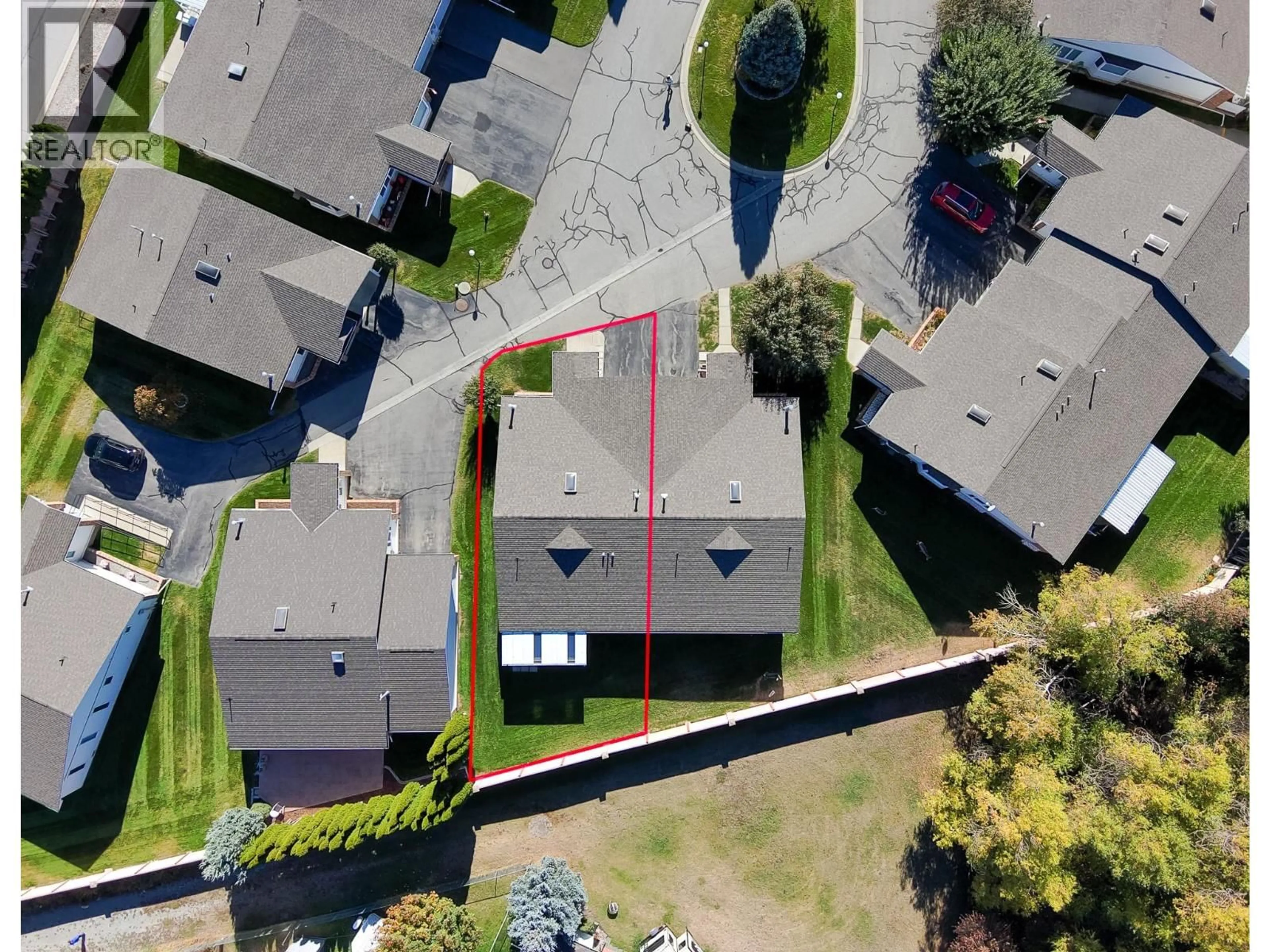 A pic from outside/outdoor area/front of a property/back of a property/a pic from drone, street for 50 - 2025 KOKANEE DRIVE NORTH, Cranbrook British Columbia V1C6J2