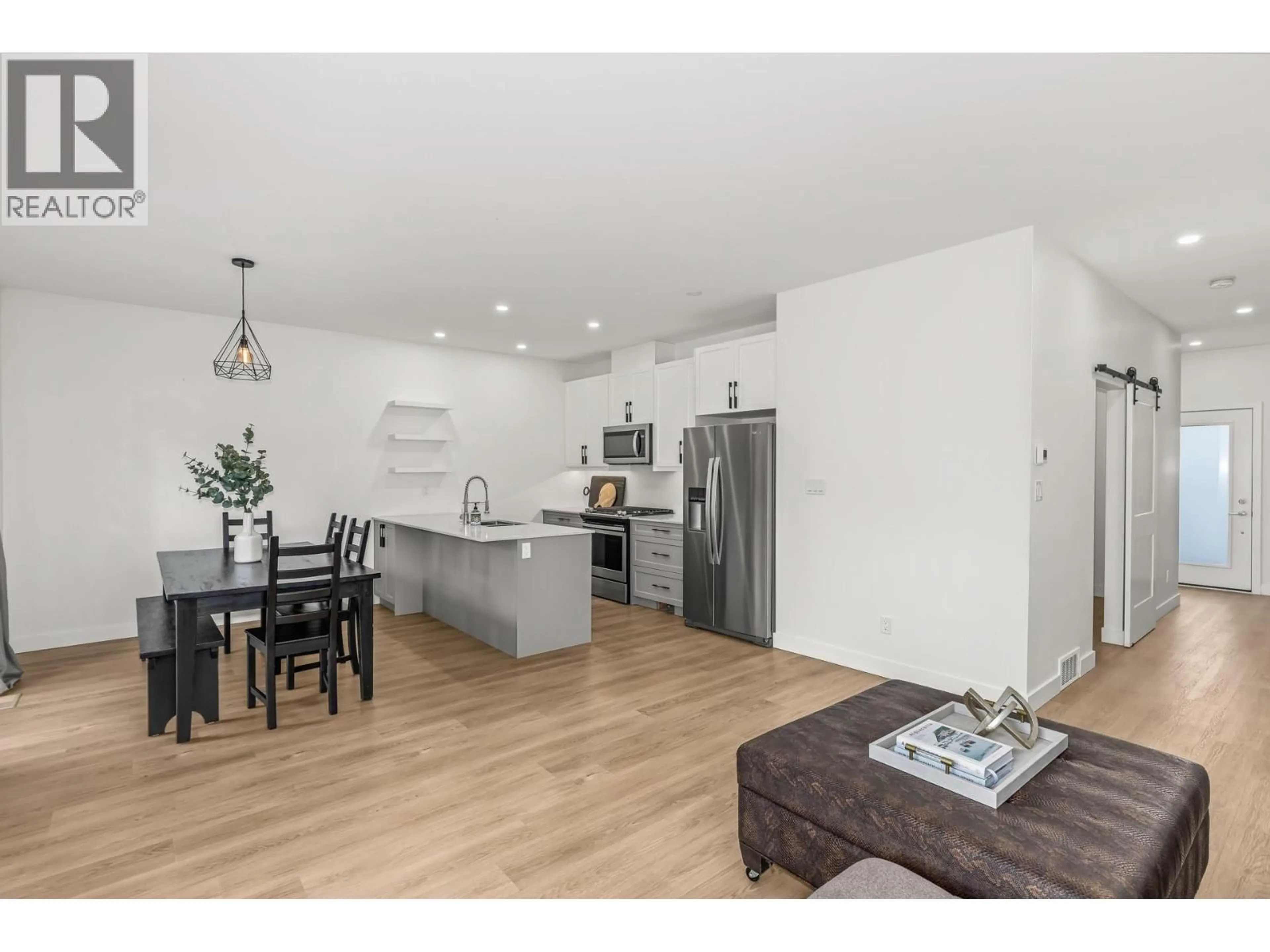 Open concept kitchen, wood/laminate floor for 103 - 5011 TOWGOOD PLACE, Summerland British Columbia V0H1Z9