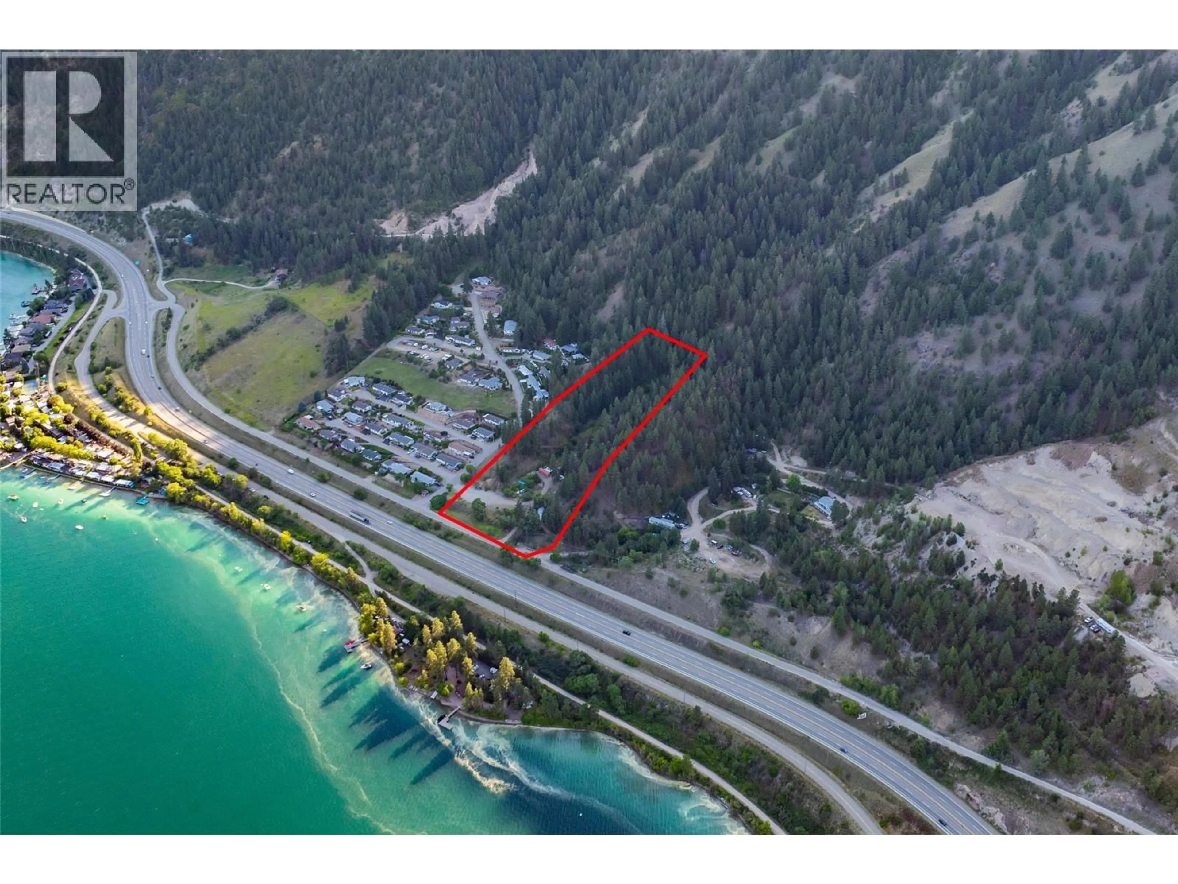 A pic from outside/outdoor area/front of a property/back of a property/a pic from drone, water/lake/river/ocean view for 17680 RAWSTHORNE ROAD, Lake Country British Columbia V4V2G1