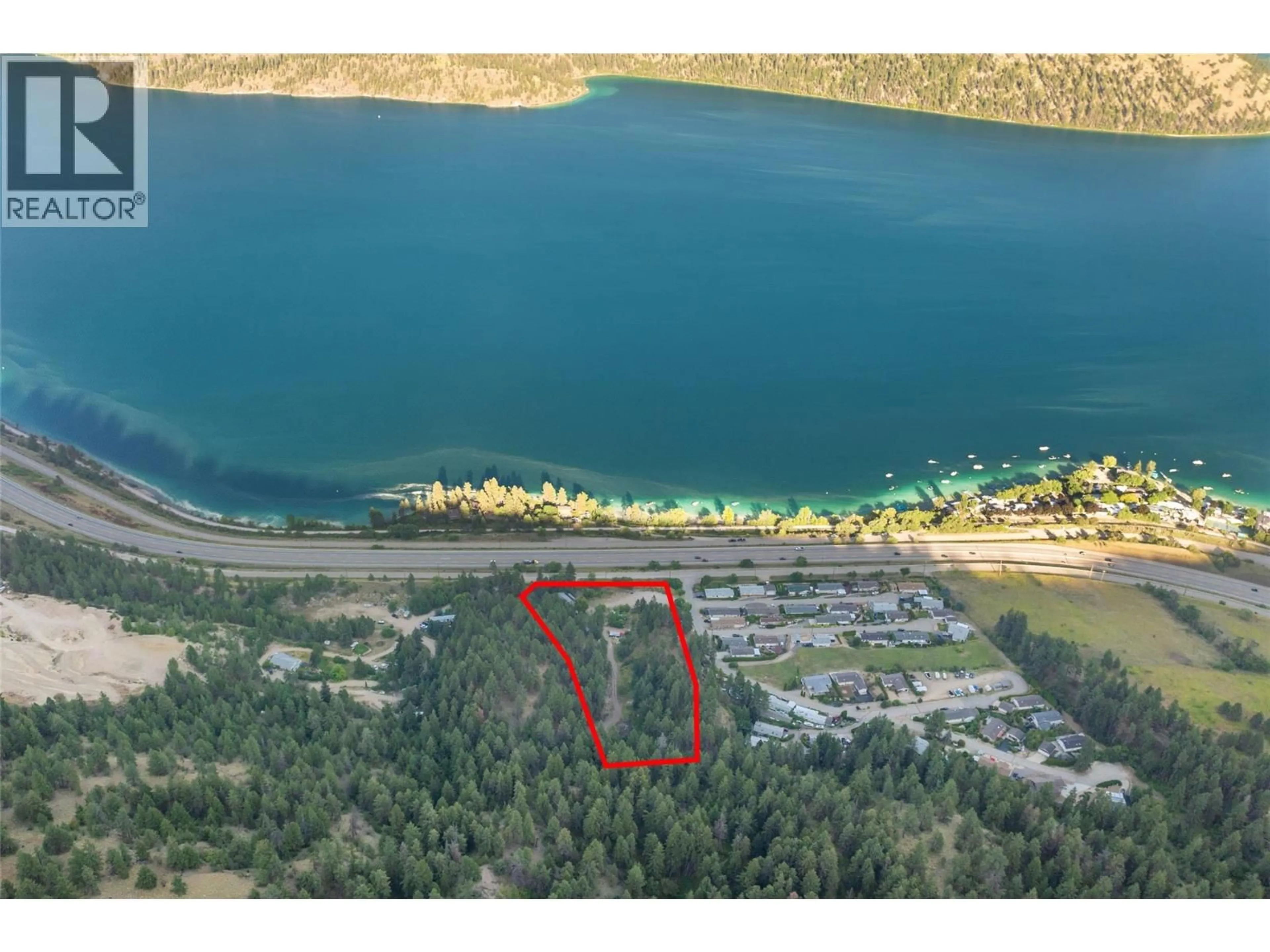 A pic from outside/outdoor area/front of a property/back of a property/a pic from drone, water/lake/river/ocean view for 17680 RAWSTHORNE ROAD, Lake Country British Columbia V4V2G1