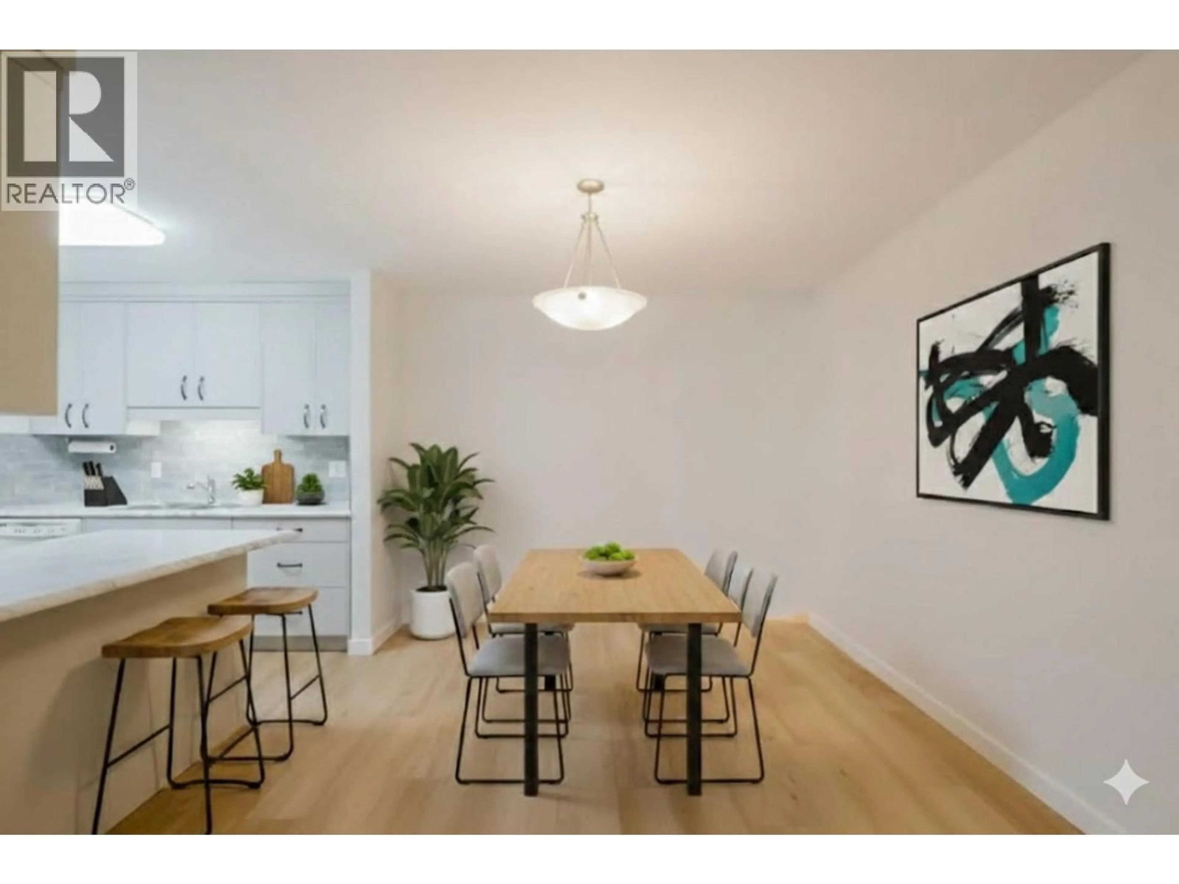 Dining room, wood/laminate floor for 104 - 262 KINNEY AVENUE, Penticton British Columbia V2A3N9