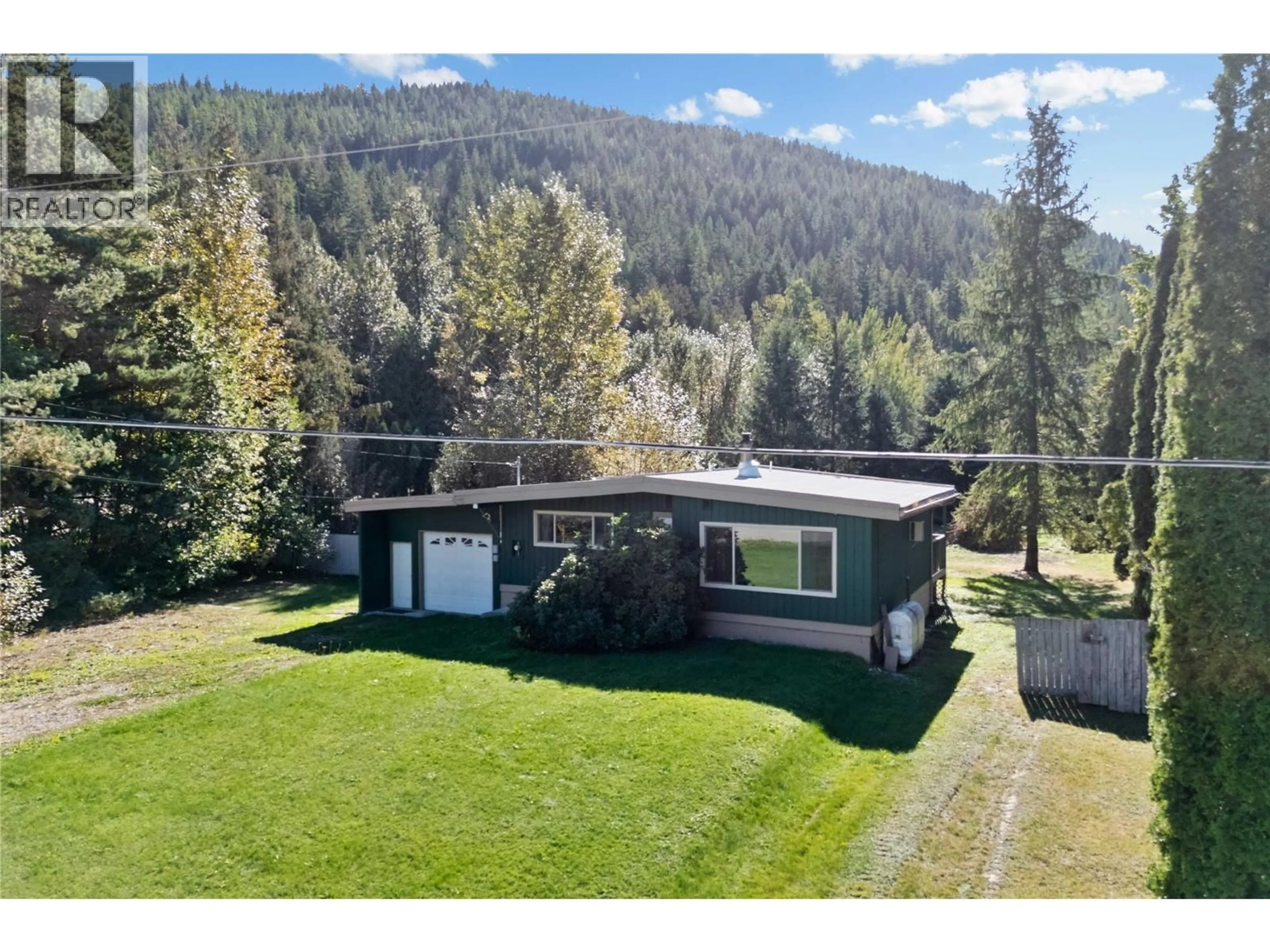 A pic from outside/outdoor area/front of a property/back of a property/a pic from drone, mountain view for 1245 MACLEAN MCPHERSON ROAD, Sicamous British Columbia V0E2V1