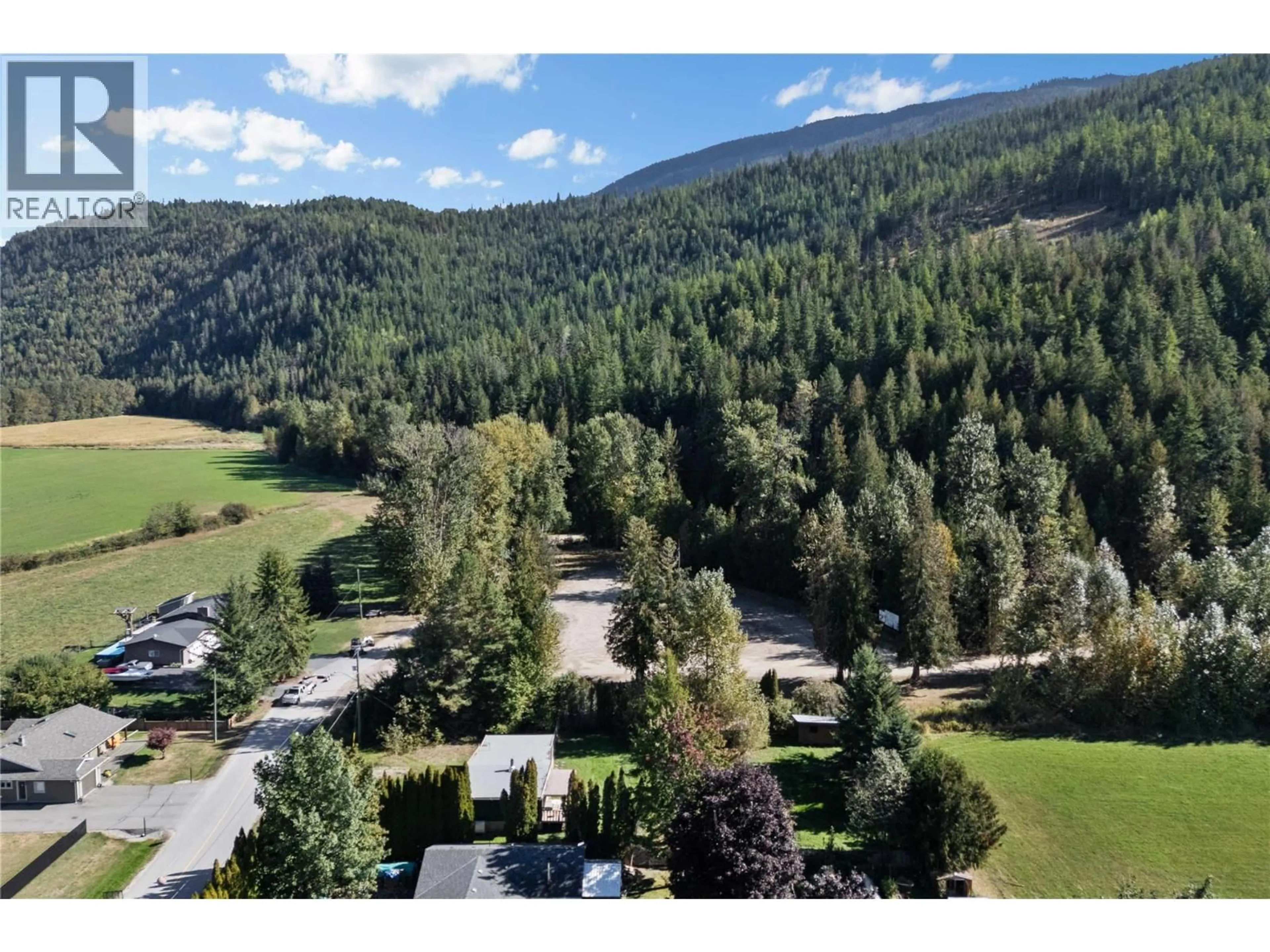 A pic from outside/outdoor area/front of a property/back of a property/a pic from drone, mountain view for 1245 MACLEAN MCPHERSON ROAD, Sicamous British Columbia V0E2V1