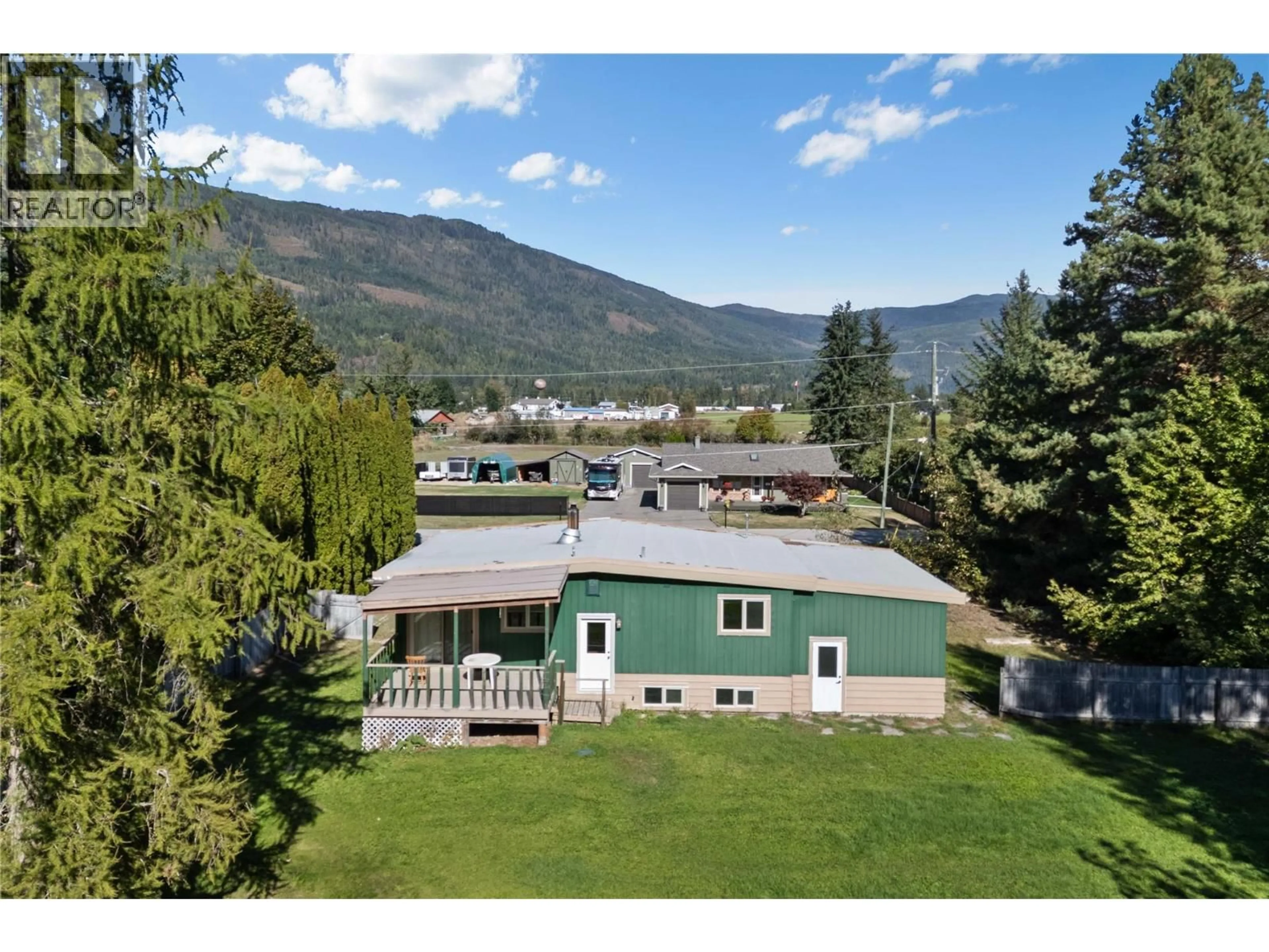 A pic from outside/outdoor area/front of a property/back of a property/a pic from drone, mountain view for 1245 MACLEAN MCPHERSON ROAD, Sicamous British Columbia V0E2V1