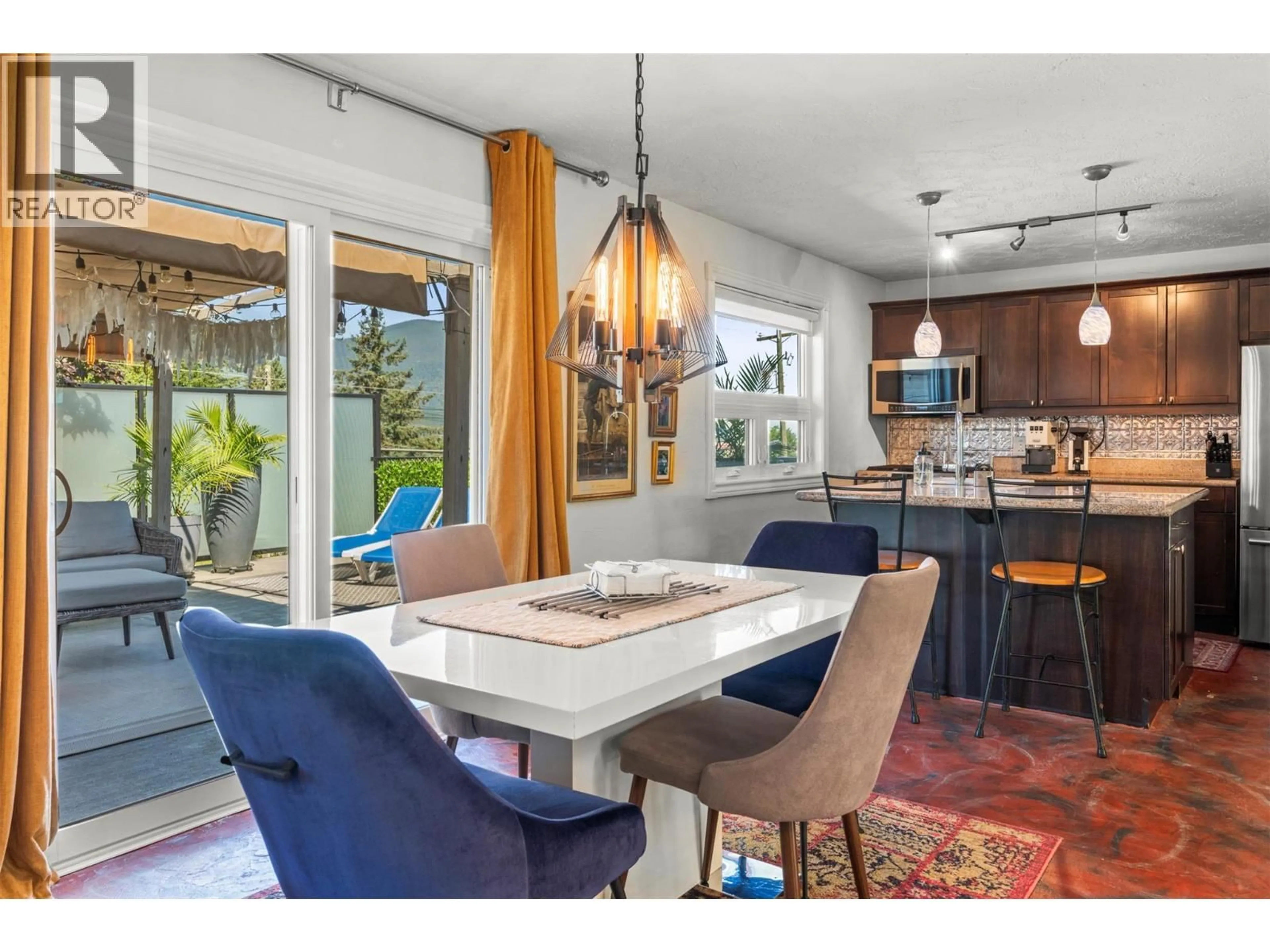 Open concept kitchen, ceramic/tile floor for 230 6 STREET SOUTHEAST, Salmon Arm British Columbia V1E4E8