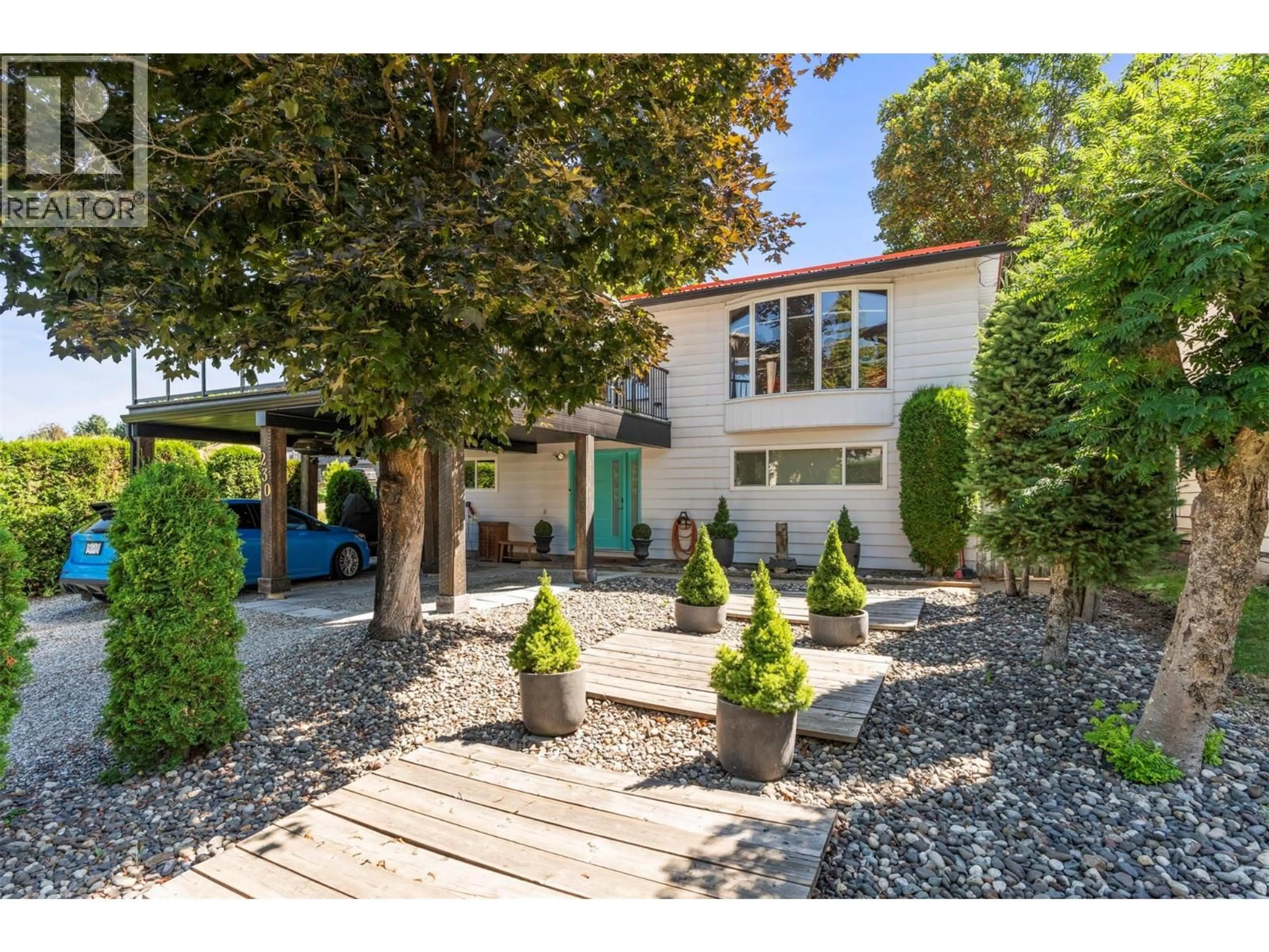 A pic from outside/outdoor area/front of a property/back of a property/a pic from drone, street for 230 6 STREET SOUTHEAST, Salmon Arm British Columbia V1E4E8