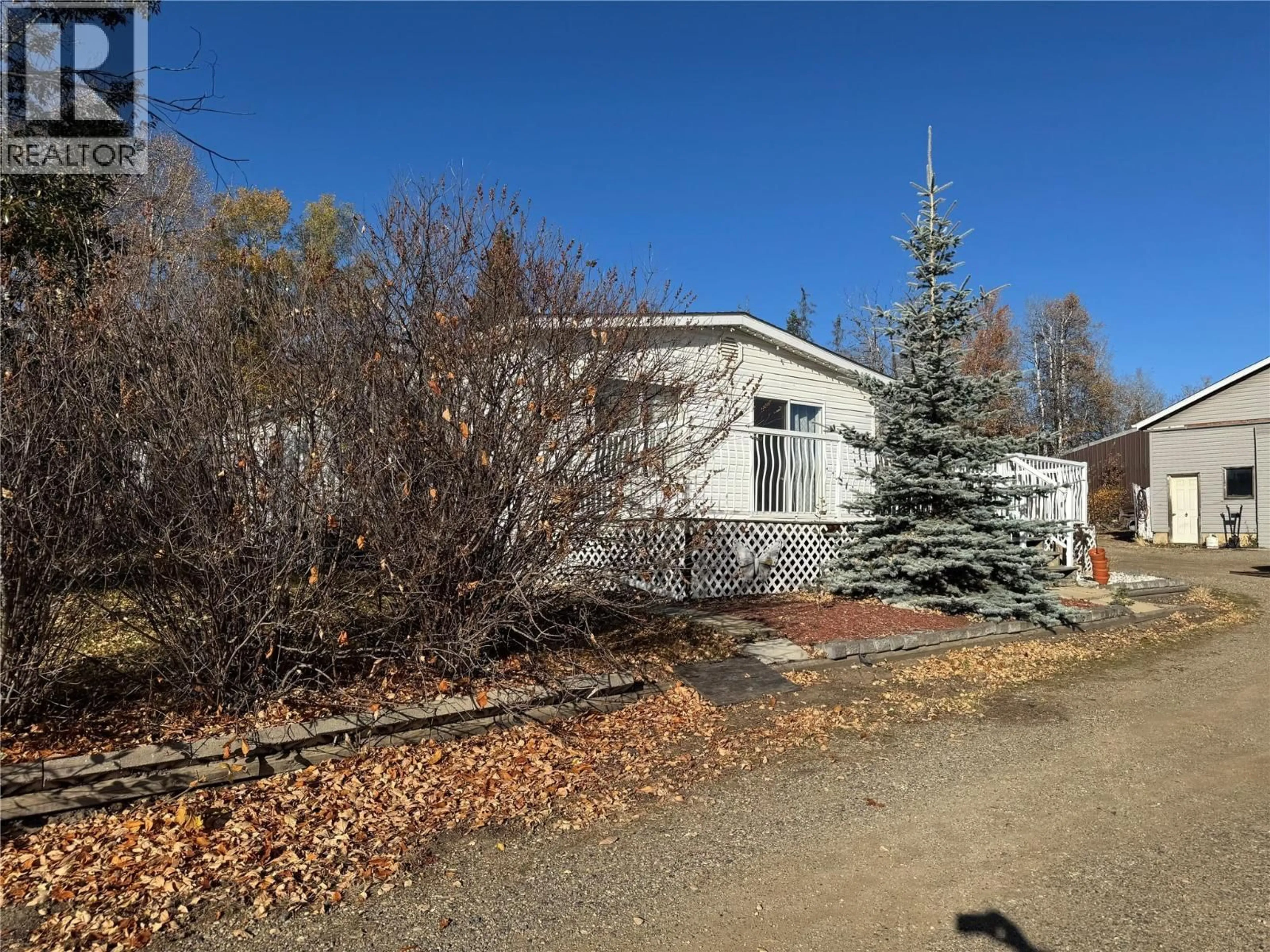 A pic from outside/outdoor area/front of a property/back of a property/a pic from drone, unknown for 4806 55 AVENUE, Pouce Coupe British Columbia V0C2C0