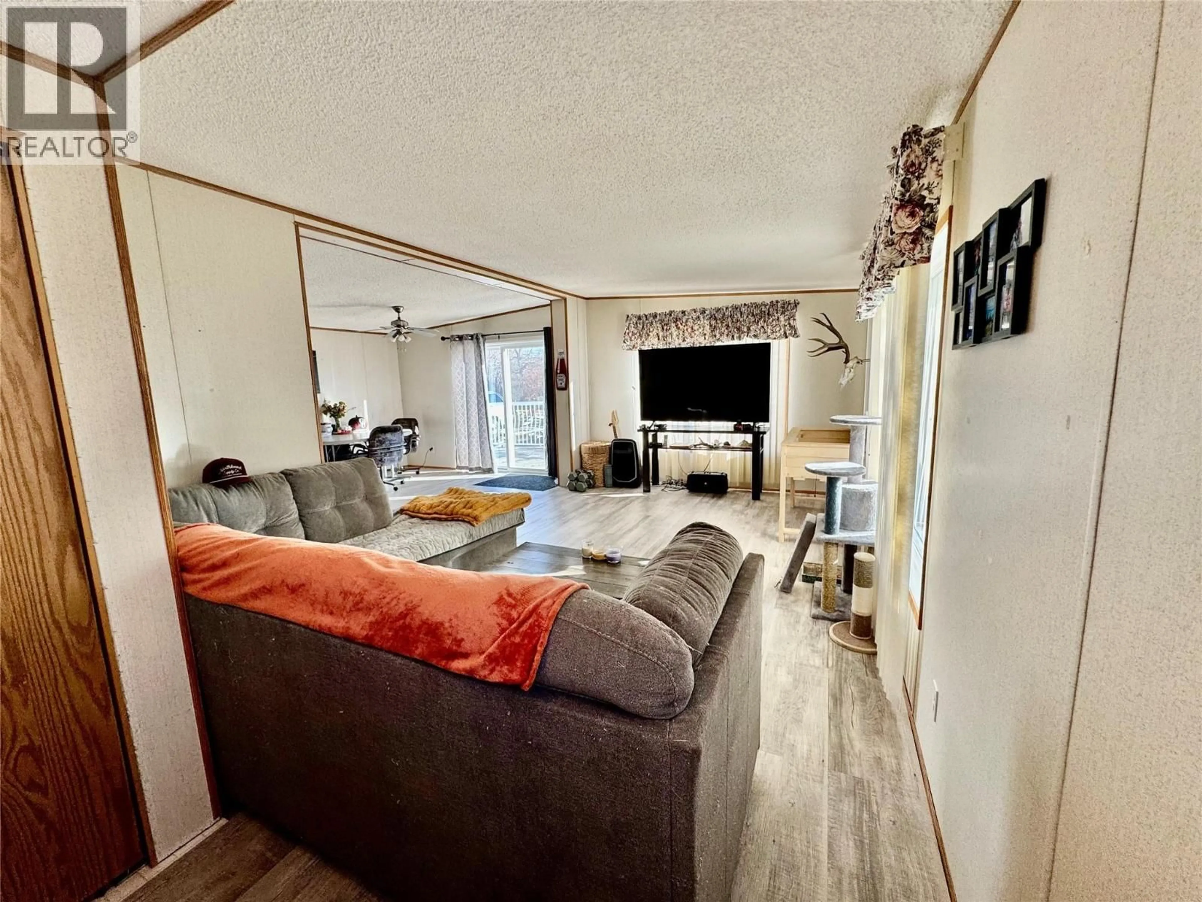 Living room with furniture, unknown for 4806 55 AVENUE, Pouce Coupe British Columbia V0C2C0