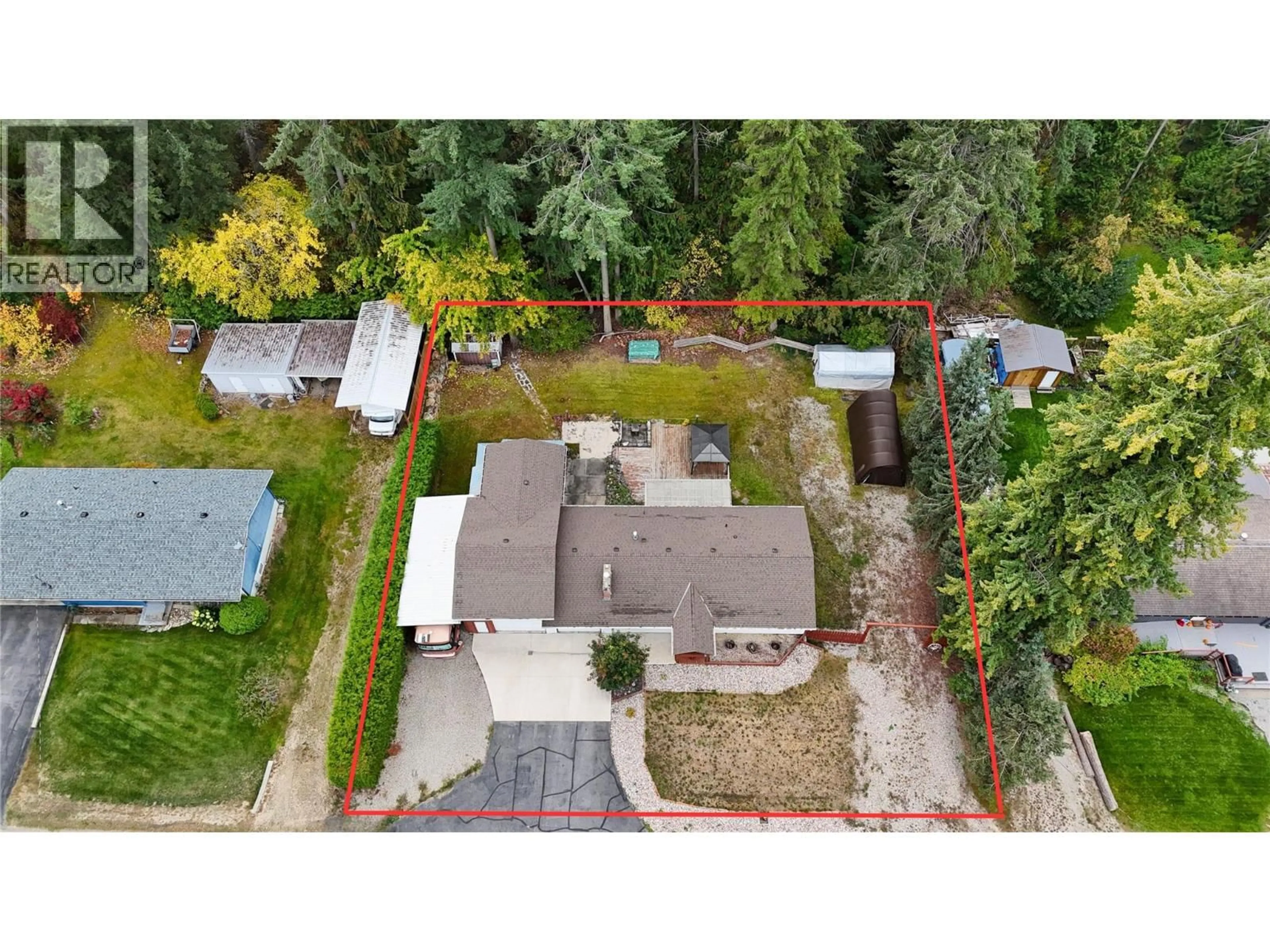 A pic from outside/outdoor area/front of a property/back of a property/a pic from drone, street for 3380 28 AVENUE NORTHEAST, Salmon Arm British Columbia V1E3G1
