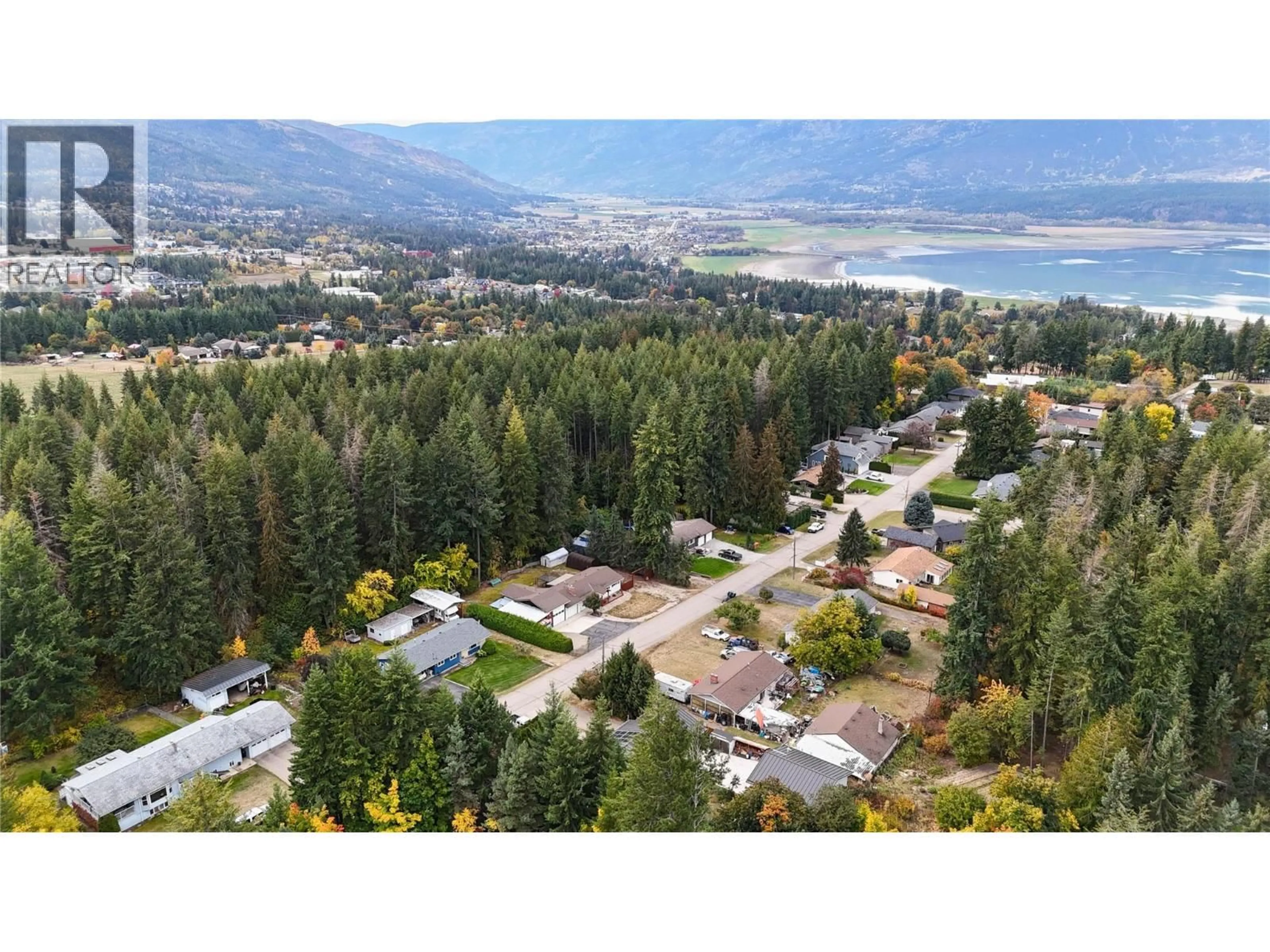 A pic from outside/outdoor area/front of a property/back of a property/a pic from drone, mountain view for 3380 28 AVENUE NORTHEAST, Salmon Arm British Columbia V1E3G1