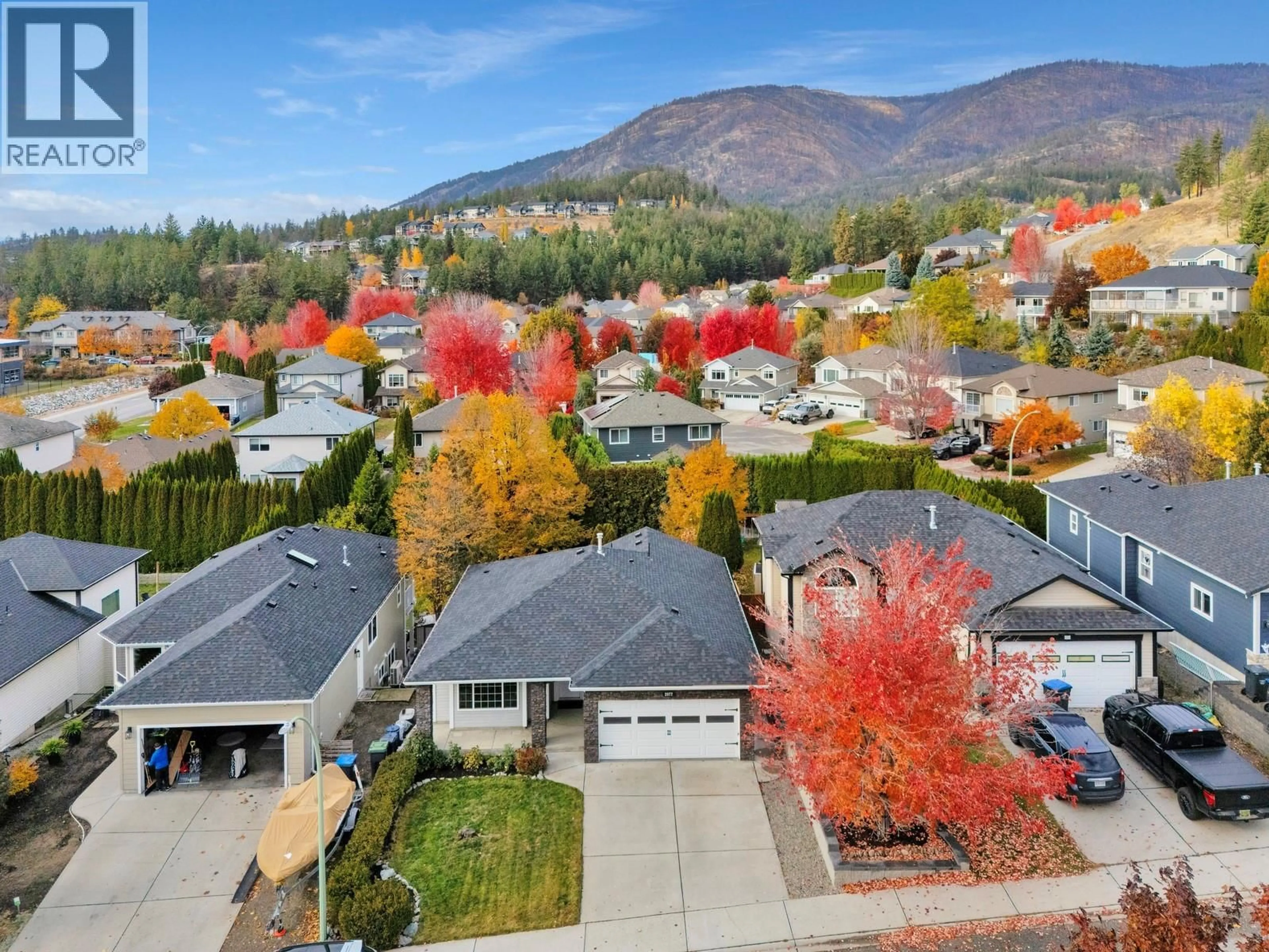 A pic from outside/outdoor area/front of a property/back of a property/a pic from drone, mountain view for 2077 ROSEFIELD DRIVE, West Kelowna British Columbia V1Z3Y8