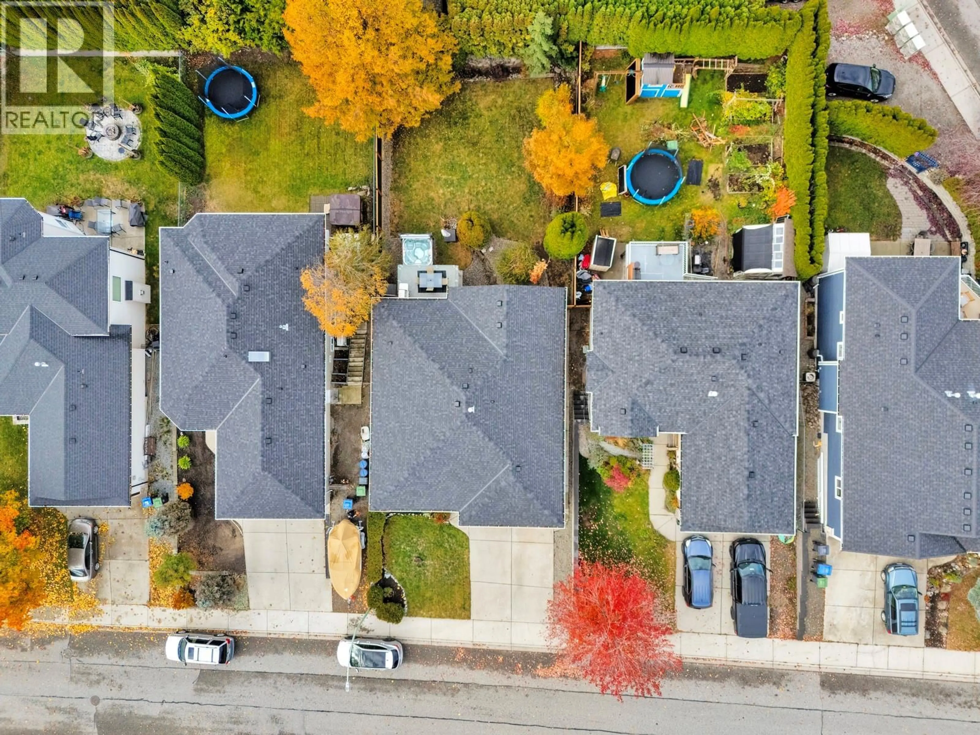 A pic from outside/outdoor area/front of a property/back of a property/a pic from drone, street for 2077 ROSEFIELD DRIVE, West Kelowna British Columbia V1Z3Y8