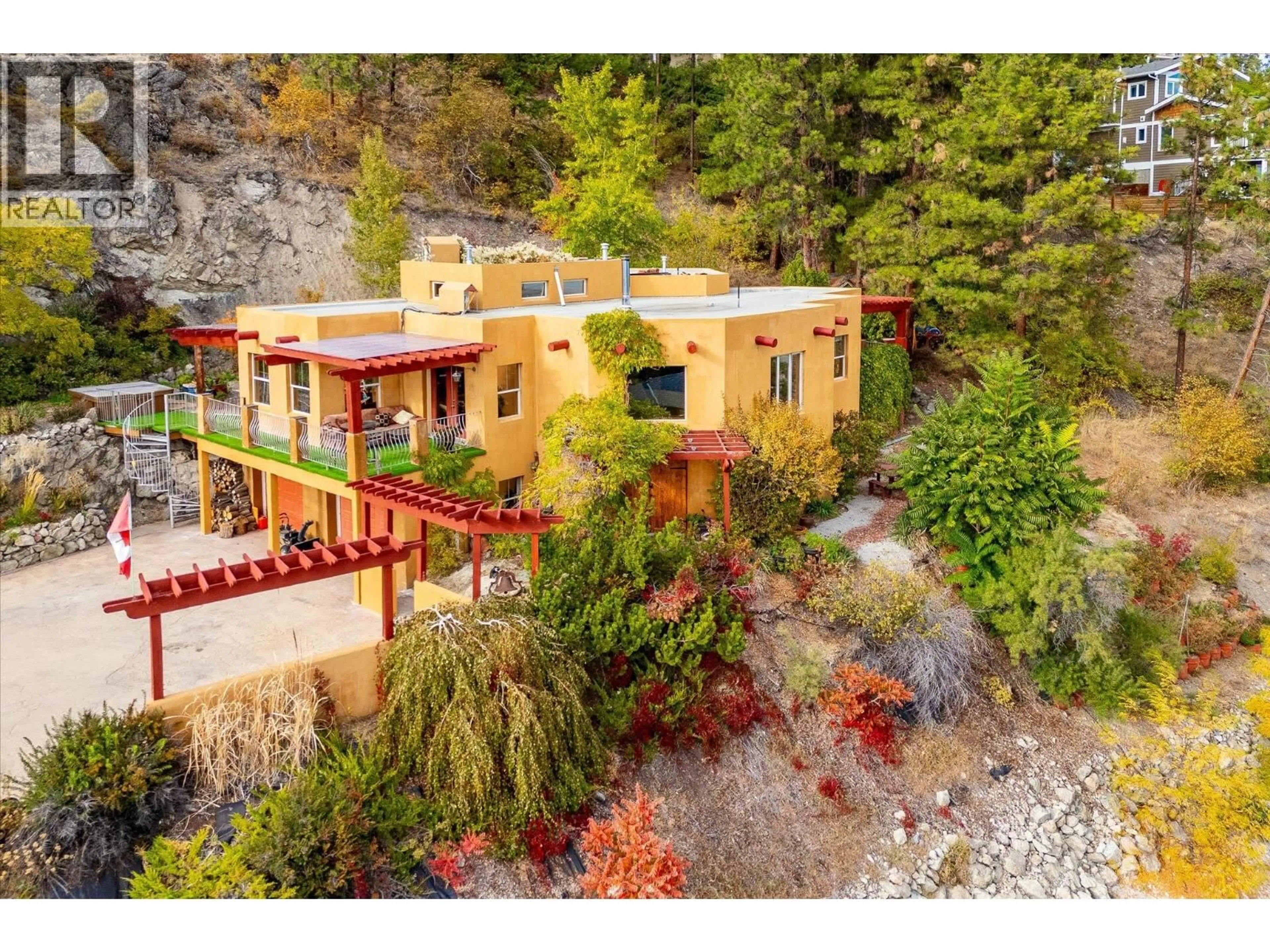 A pic from outside/outdoor area/front of a property/back of a property/a pic from drone, unknown for 4610 PONDEROSA DRIVE, Peachland British Columbia V0H1X5
