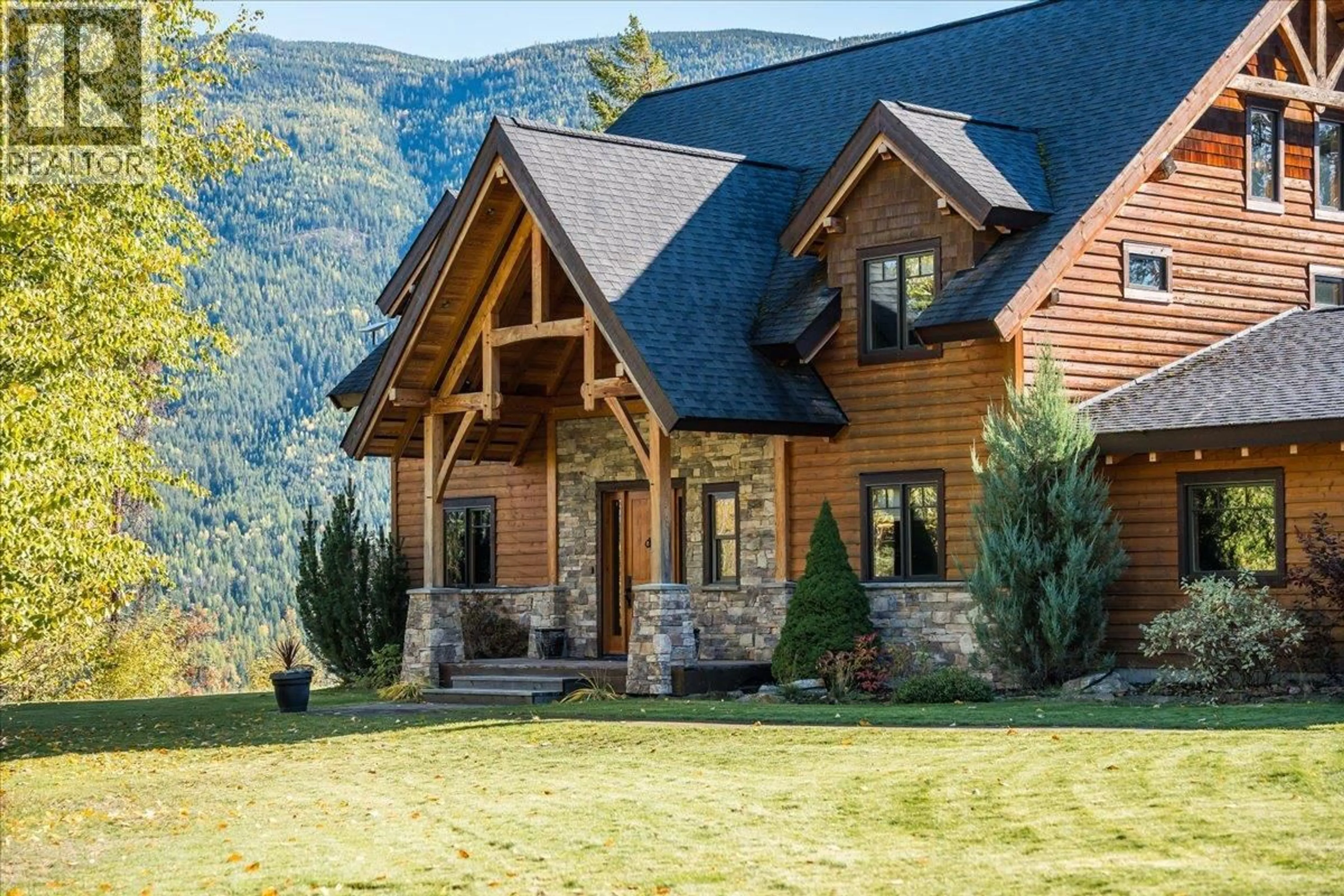 Home with brick exterior material, mountain view for 127 GRIZZLY PLACE, Castlegar British Columbia V1N4T5