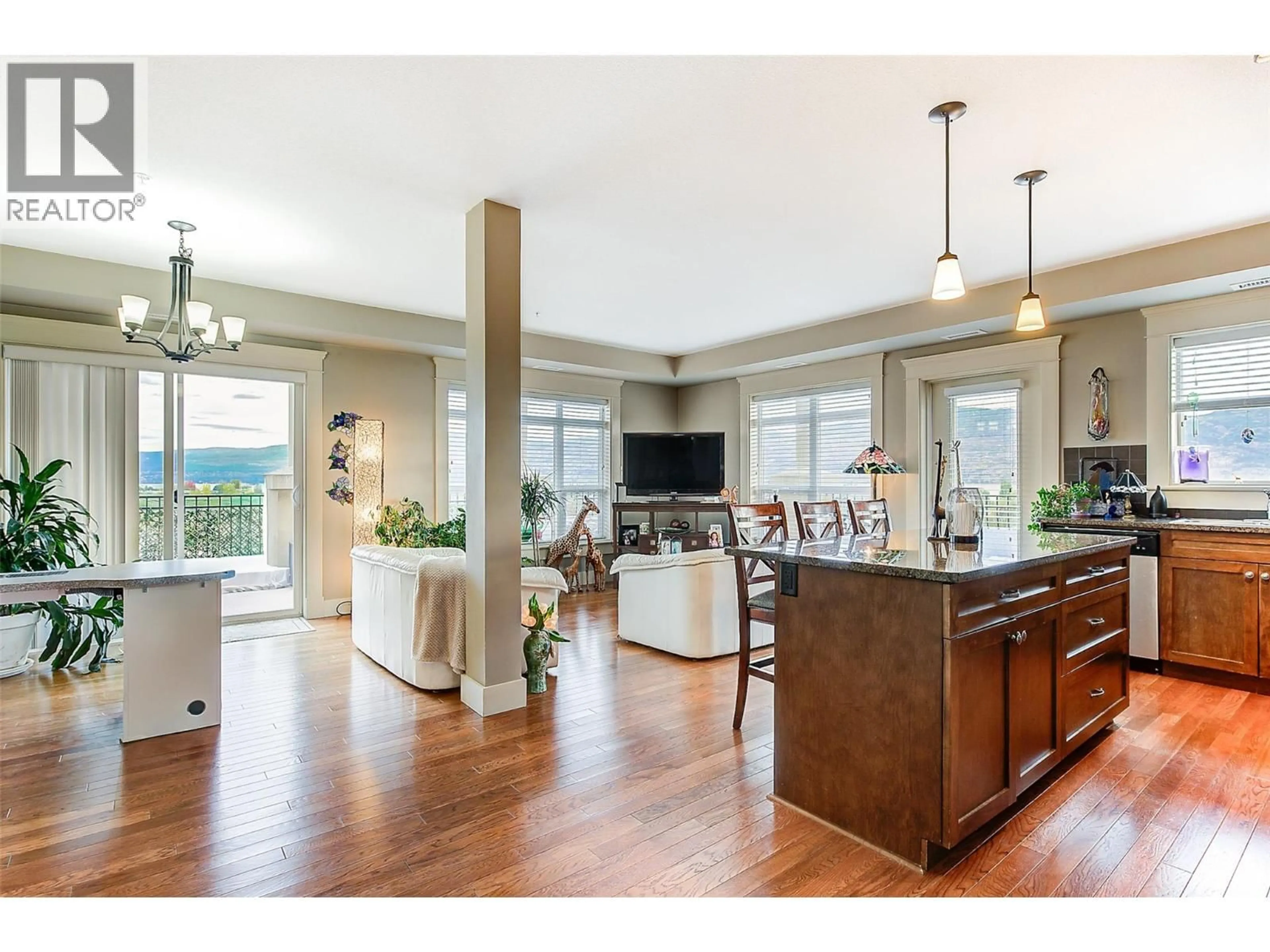 Open concept kitchen, wood/laminate floor for 517 - 2070 BOUCHERIE ROAD, West Kelowna British Columbia V4T3K9