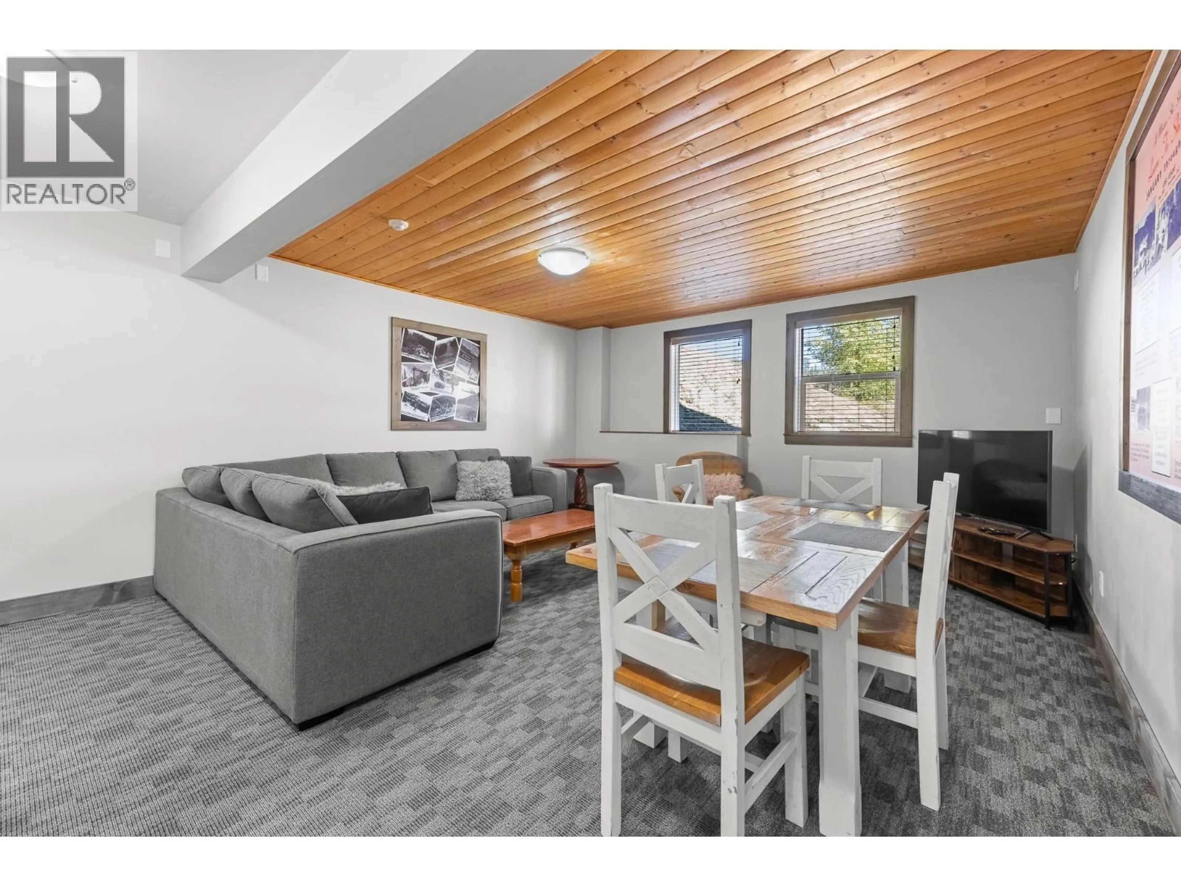 Living room with furniture, wood/laminate floor for C-13 - 360 STRAYHORSE ROAD, Apex Mountain British Columbia V0X1K0