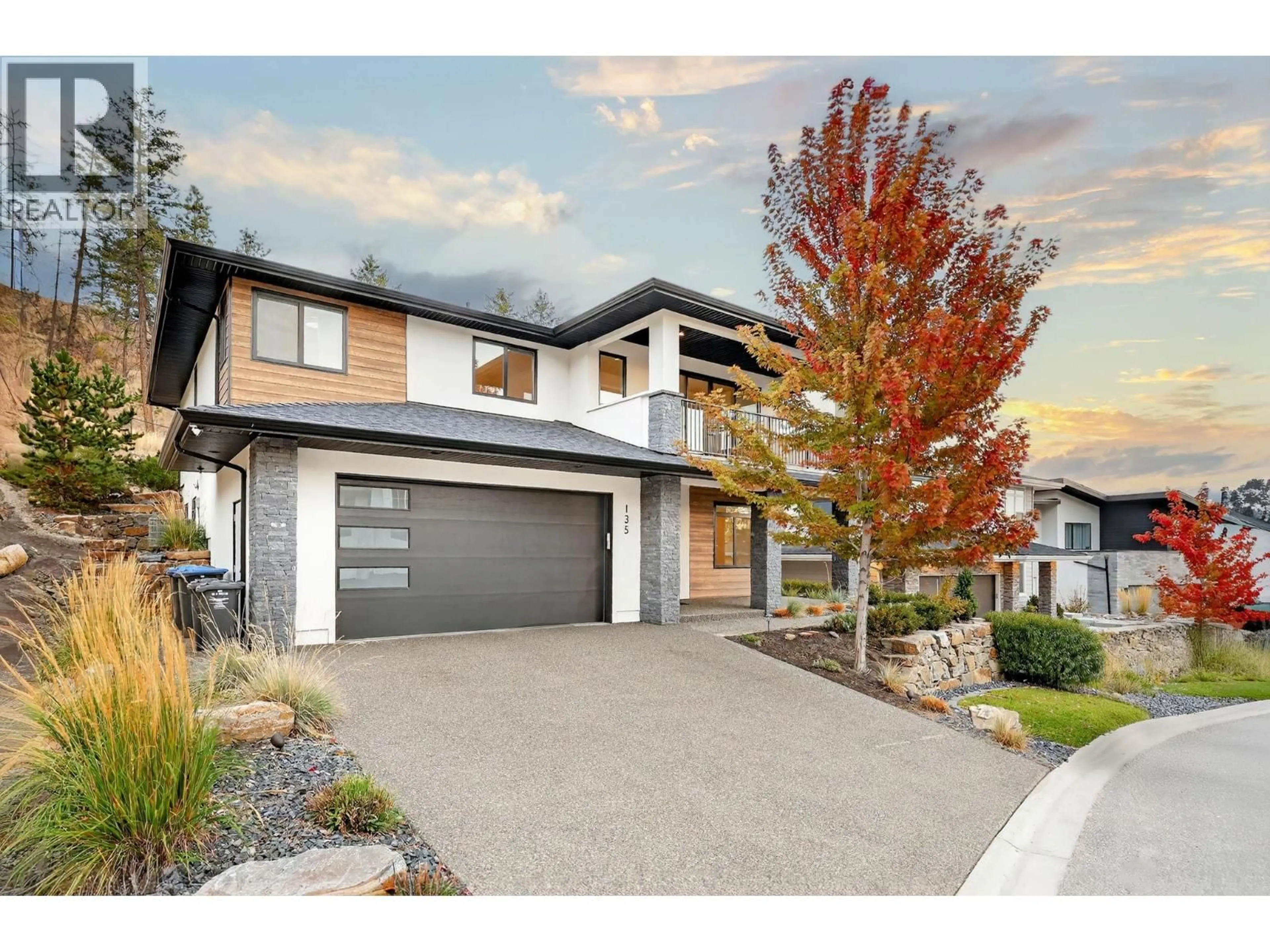 Home with brick exterior material, street for 135 ECHO RIDGE DRIVE, Kelowna British Columbia V1V0C9