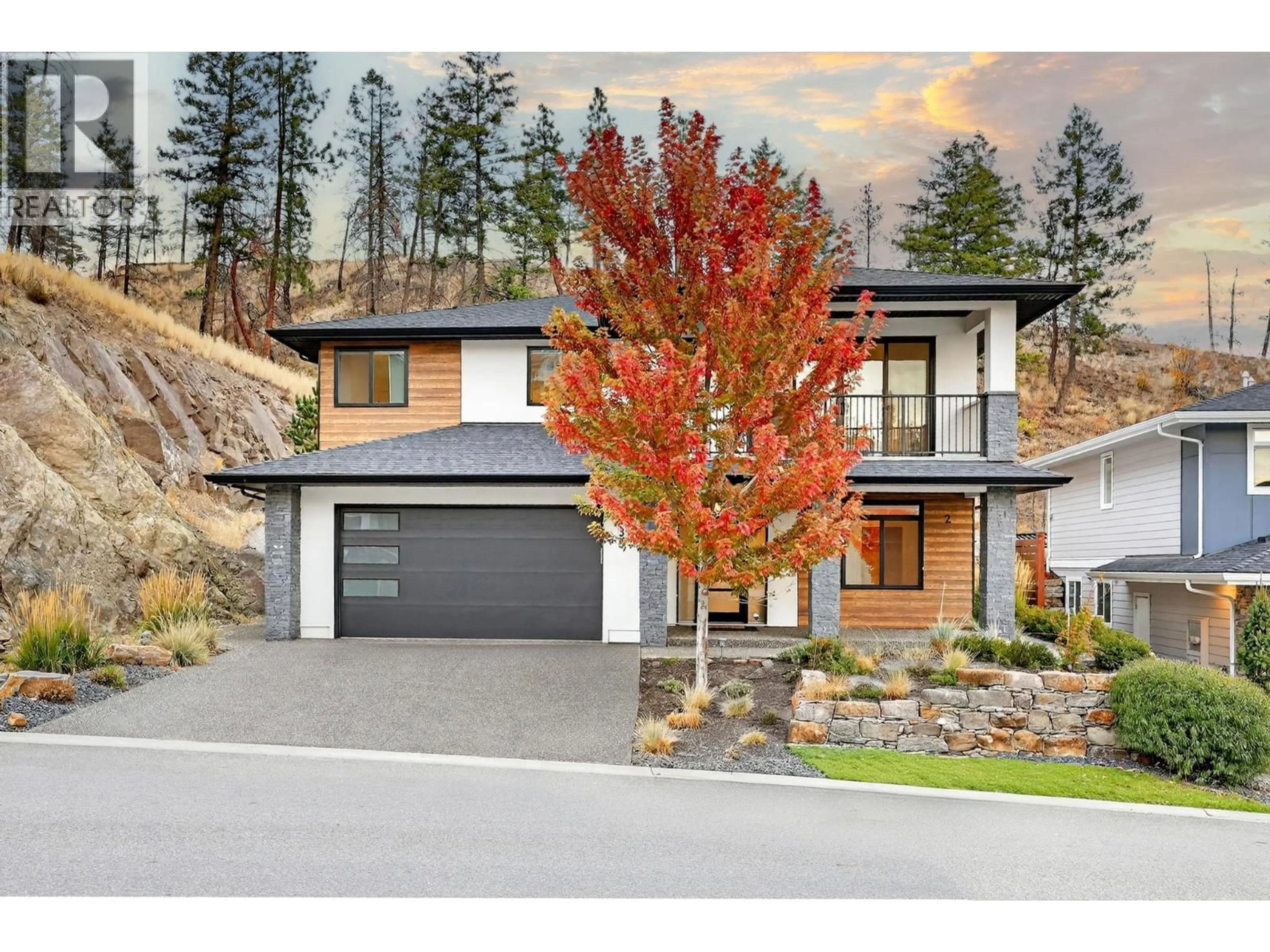 Home with vinyl exterior material, street for 135 ECHO RIDGE DRIVE, Kelowna British Columbia V1V0C9