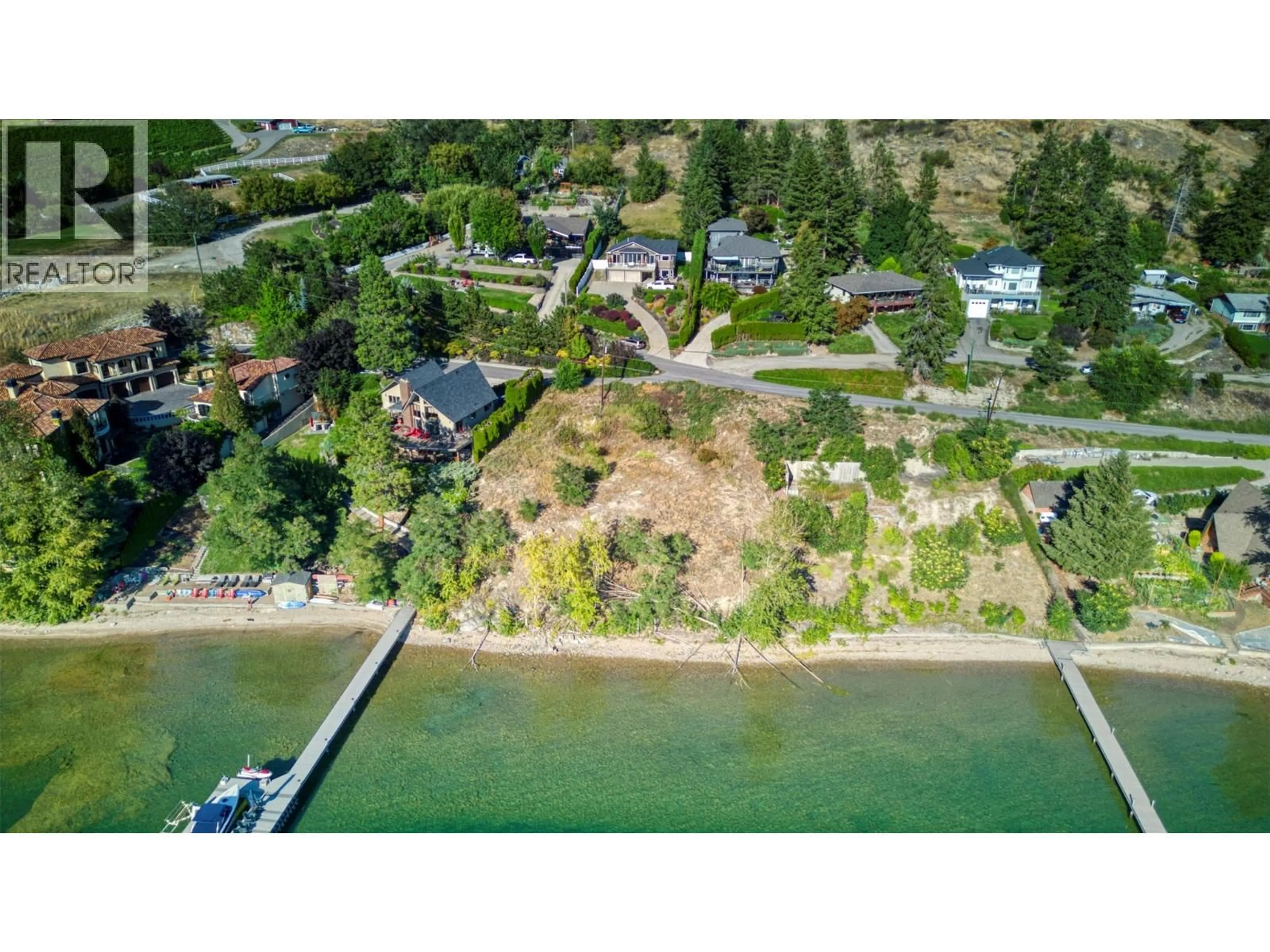 A pic from outside/outdoor area/front of a property/back of a property/a pic from drone, water/lake/river/ocean view for 12975 PIXTON ROAD, Lake Country British Columbia V4V1C9