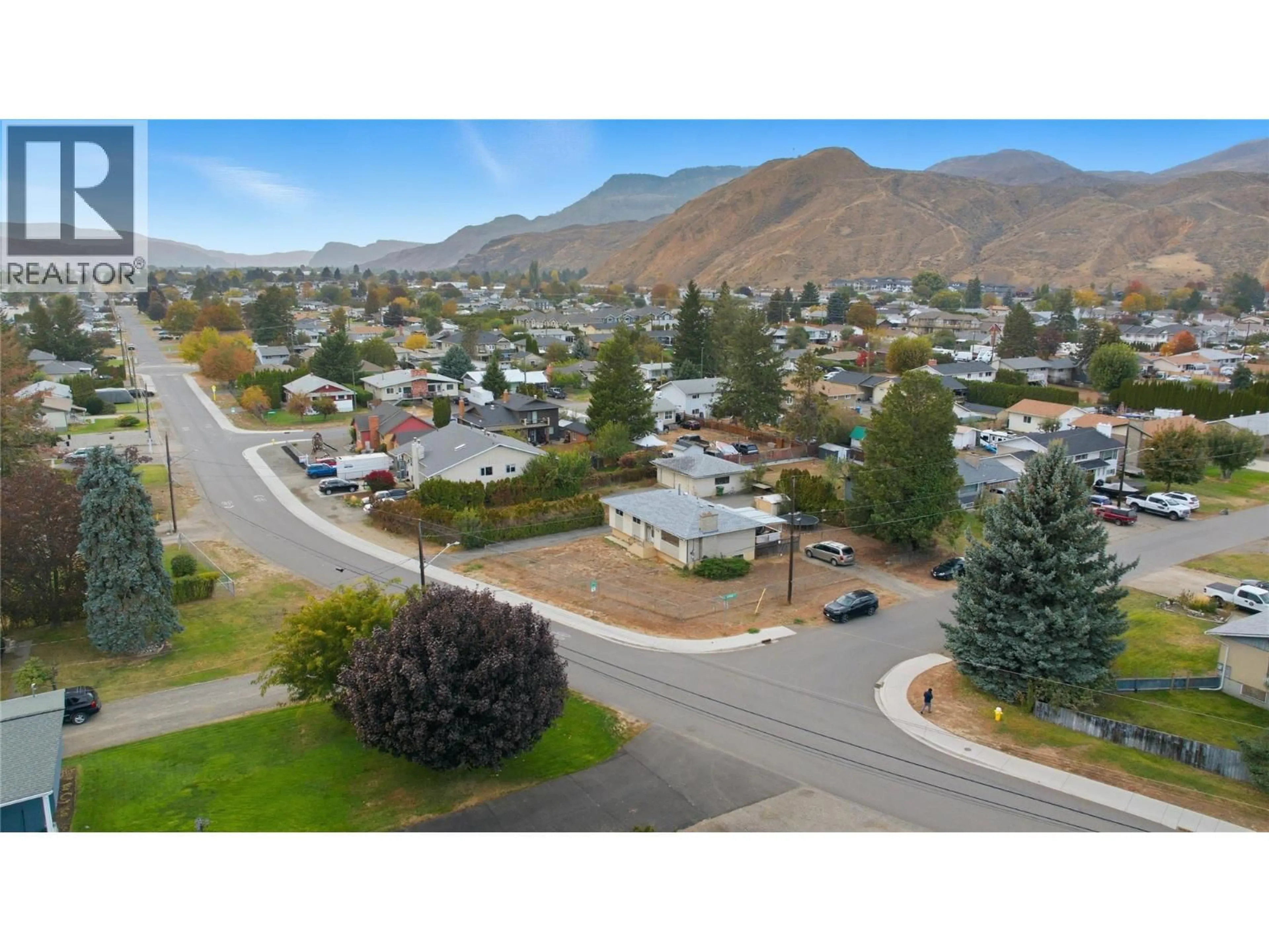 A pic from outside/outdoor area/front of a property/back of a property/a pic from drone, mountain view for 1838 FLEETWOOD AVENUE, Kamloops British Columbia V2B4S1