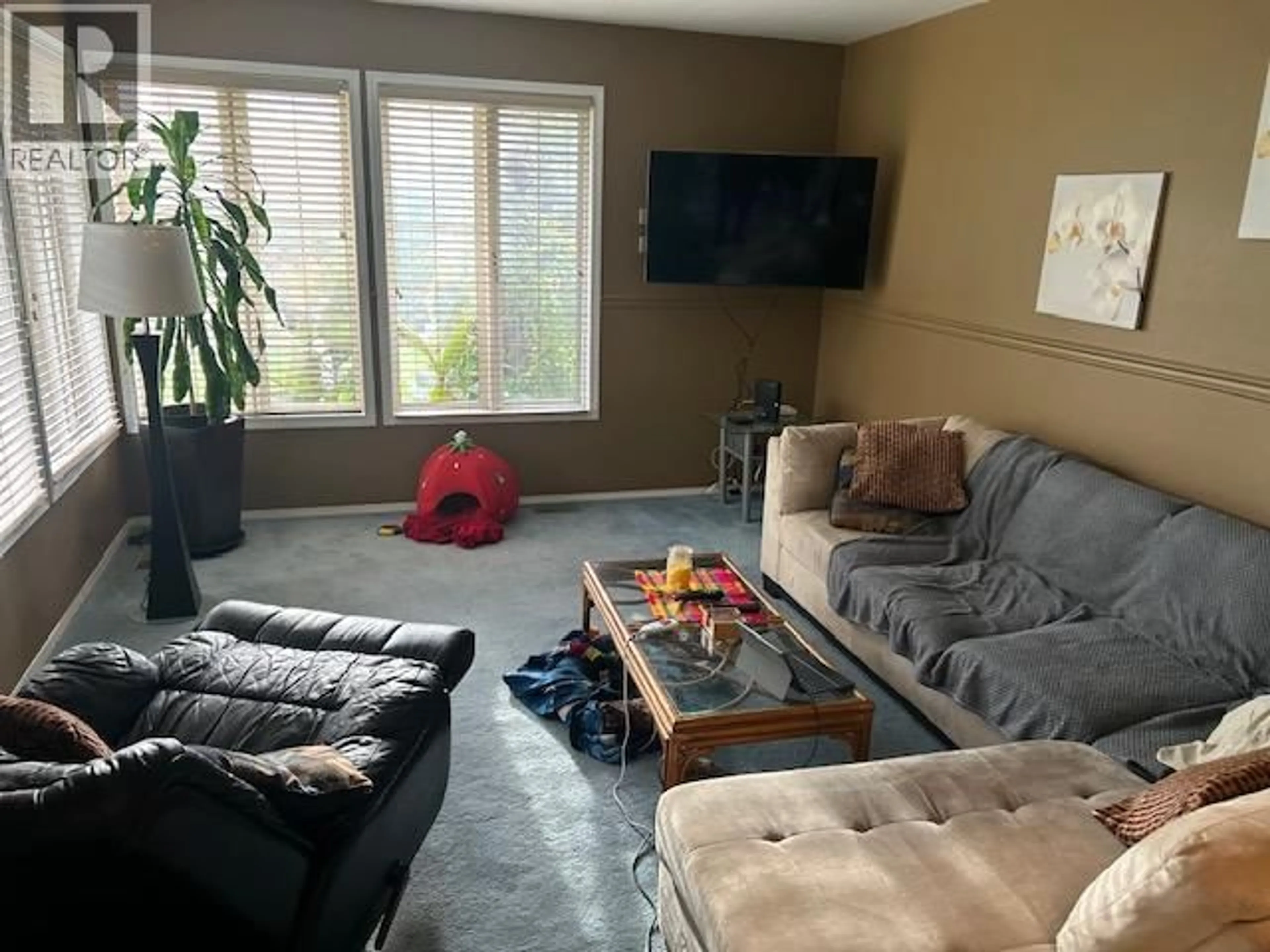 Living room with furniture, unknown for 3599 LAKESHORE ROAD, Kelowna British Columbia V1W3K1