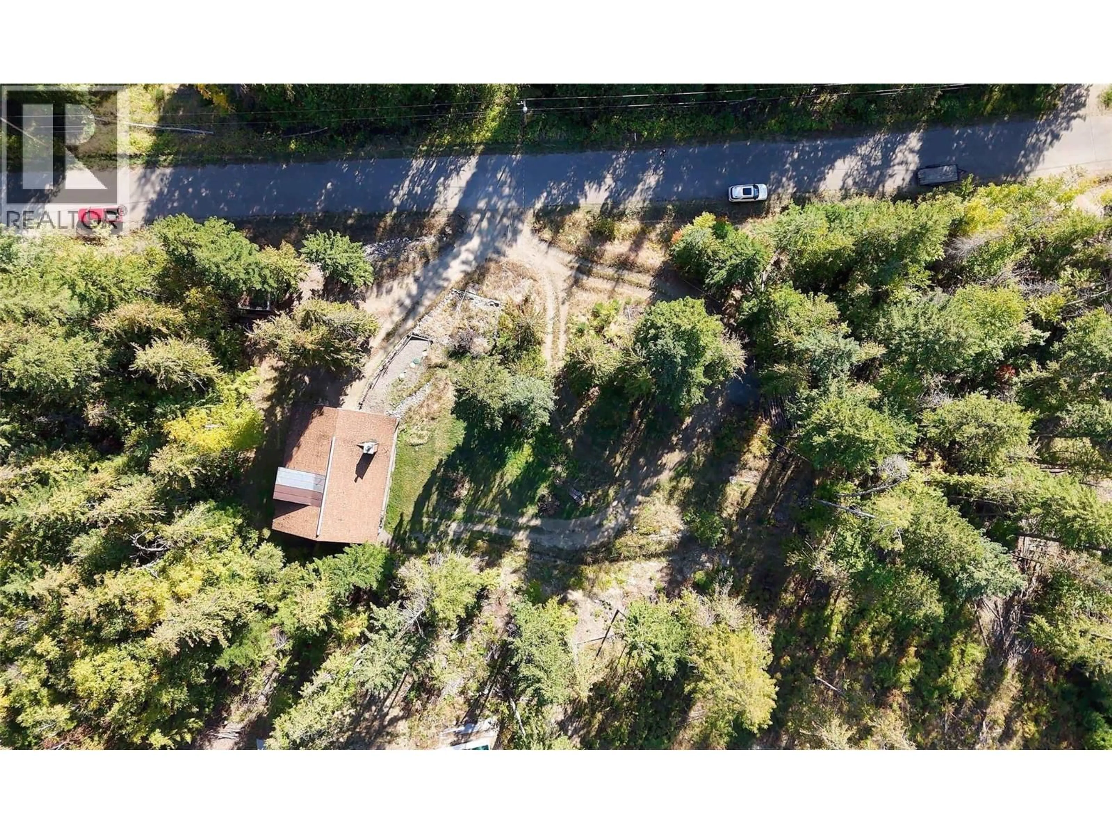 A pic from outside/outdoor area/front of a property/back of a property/a pic from drone, forest/trees view for CROWFOOT DRIVE, Anglemont British Columbia V0E1M8
