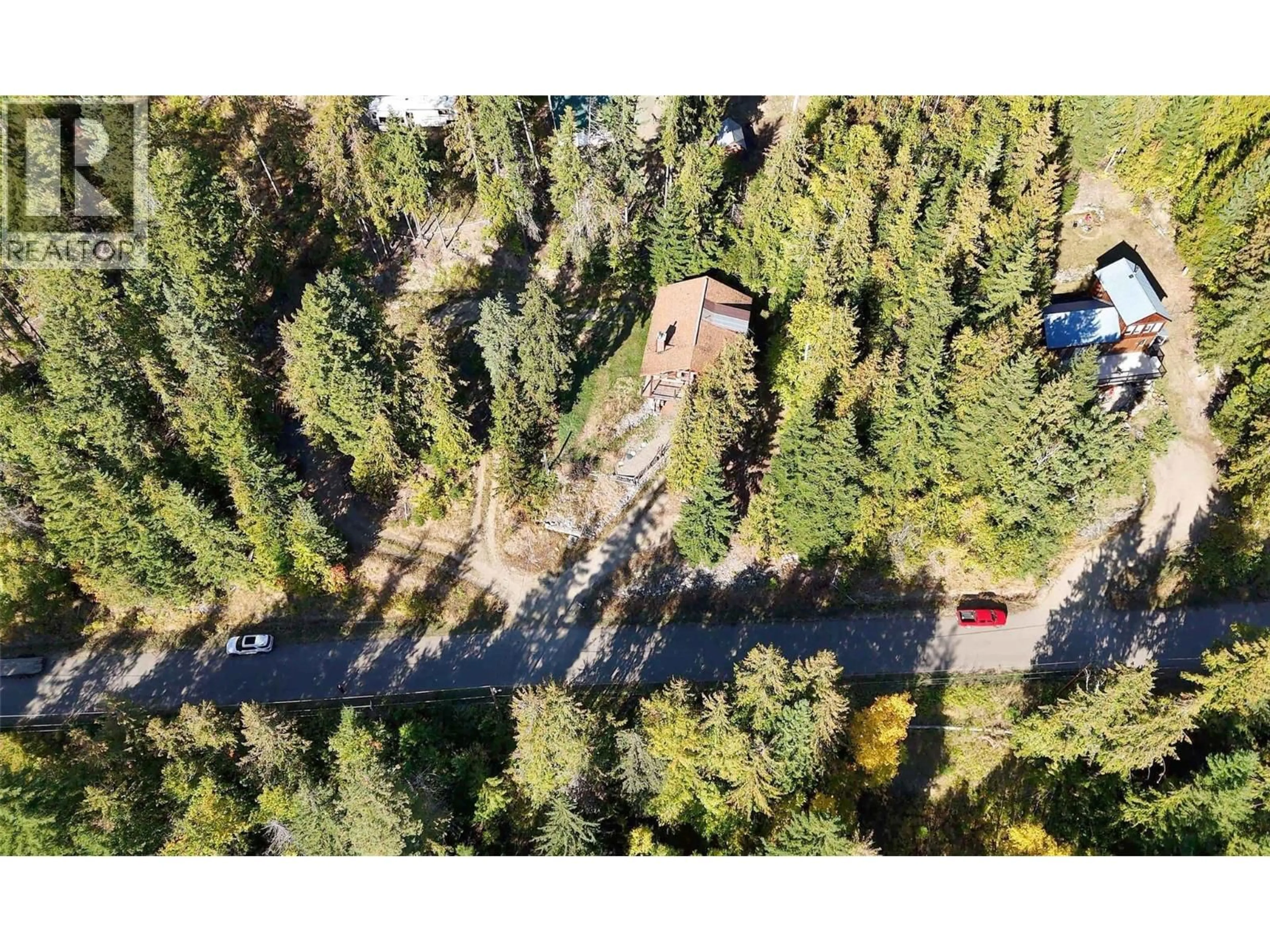 A pic from outside/outdoor area/front of a property/back of a property/a pic from drone, forest/trees view for CROWFOOT DRIVE, Anglemont British Columbia V0E1M8