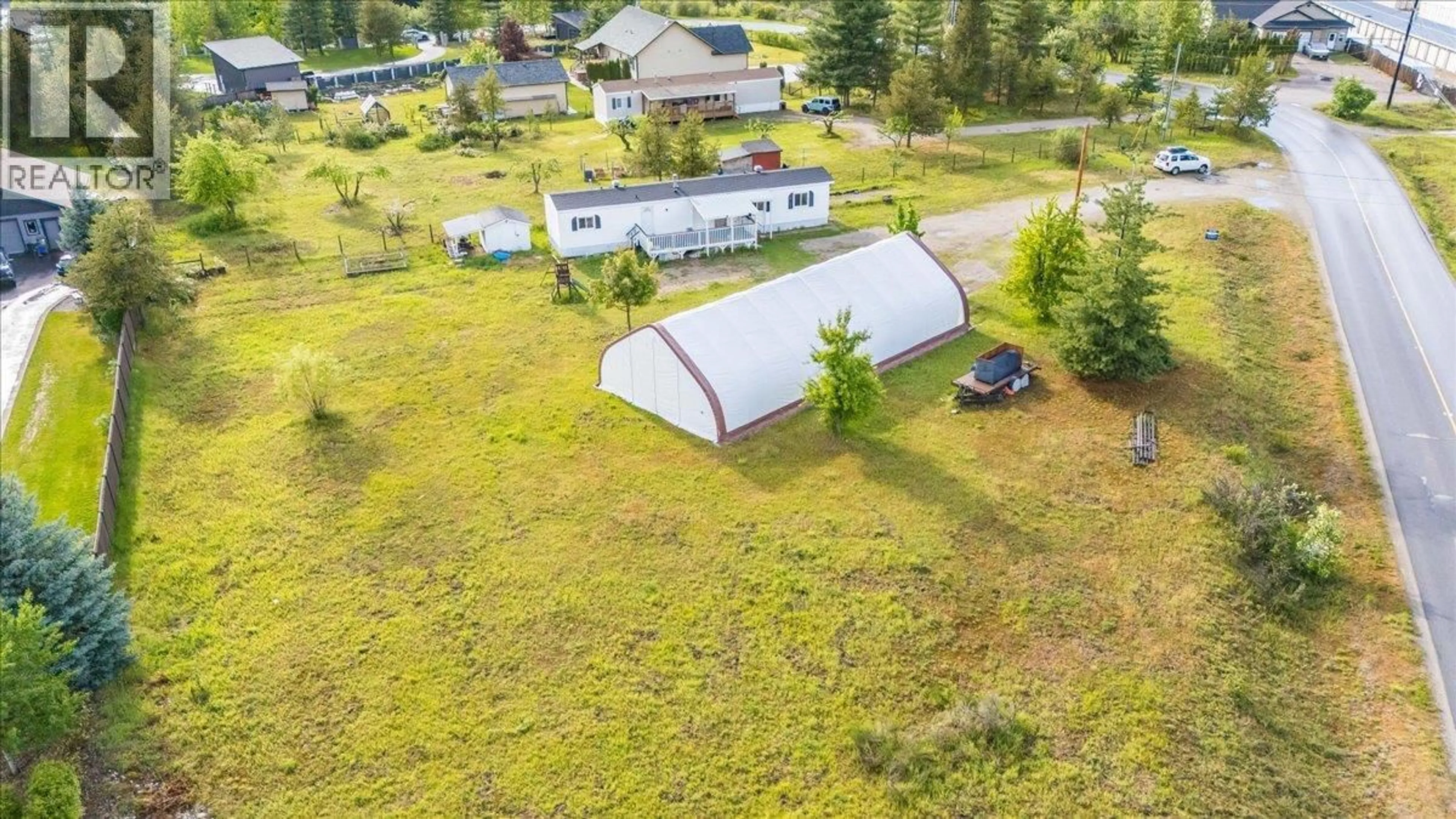 A pic from outside/outdoor area/front of a property/back of a property/a pic from drone, unknown for 996 WATERLOO ROAD, Ootischenia British Columbia V1N4M3