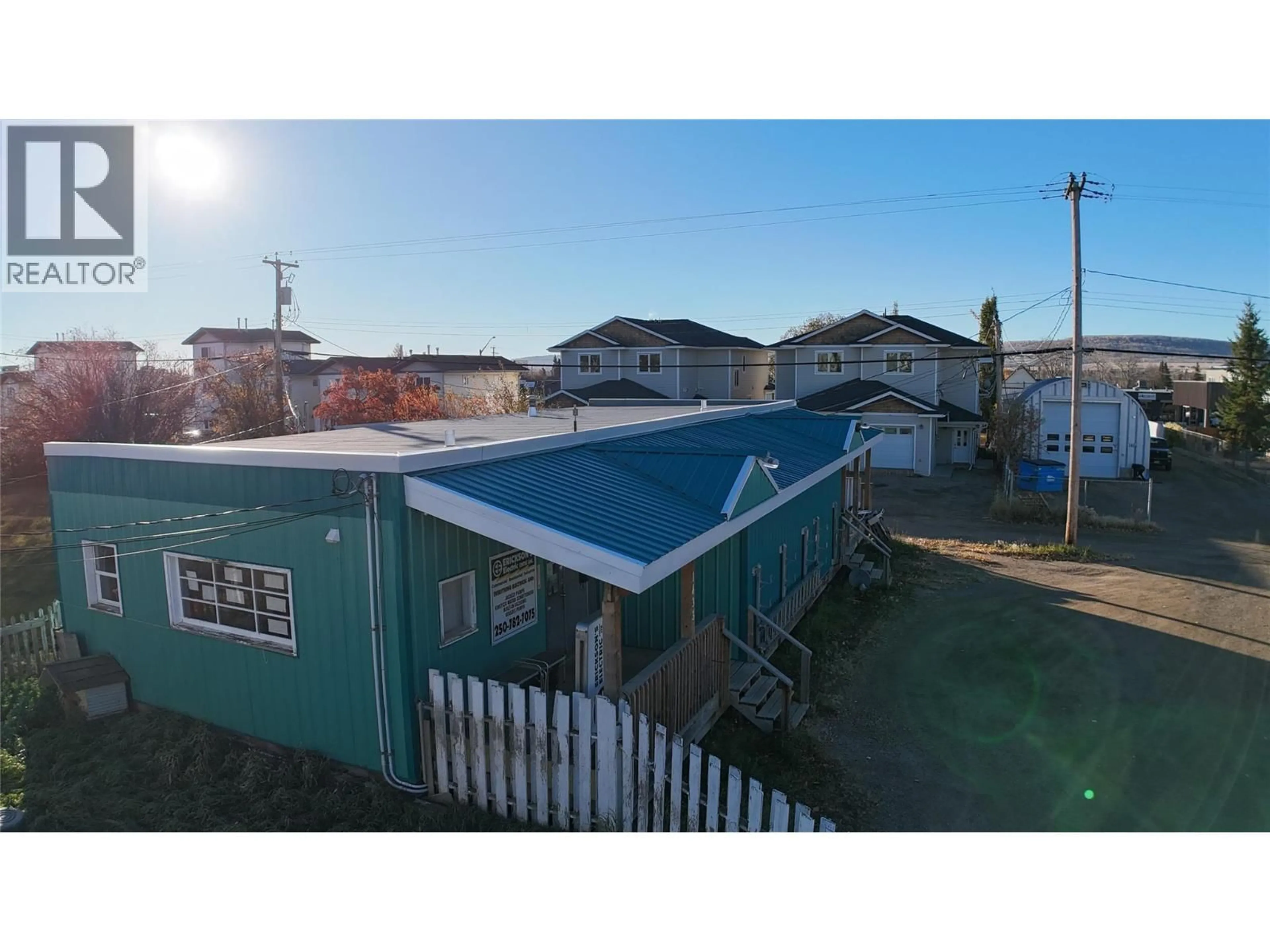 A pic from outside/outdoor area/front of a property/back of a property/a pic from drone, unknown for 1433/1437 101 AVENUE, Dawson Creek British Columbia V1G2A6