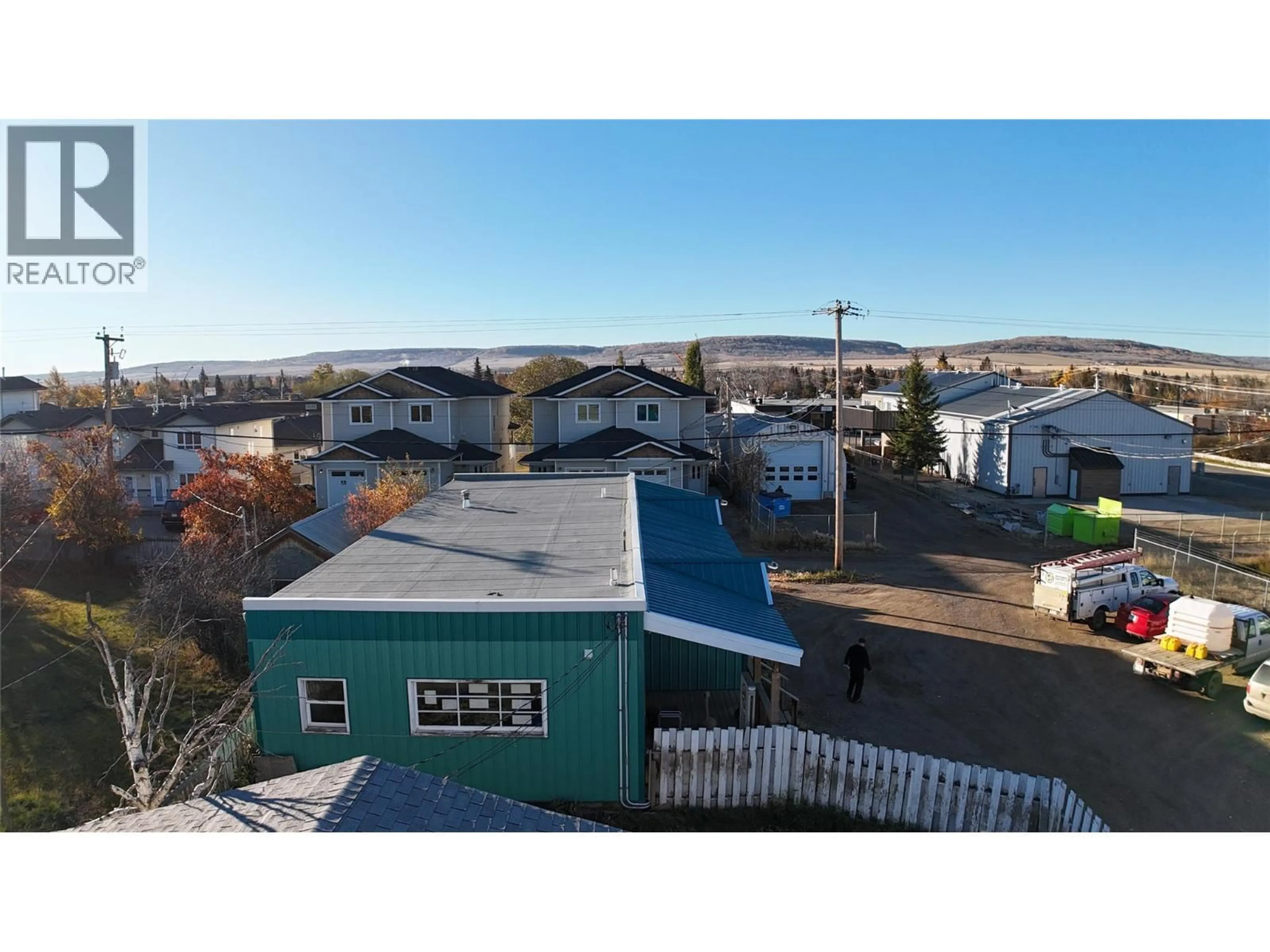 A pic from outside/outdoor area/front of a property/back of a property/a pic from drone, unknown for 1433/1437 101 AVENUE, Dawson Creek British Columbia V1G2A6