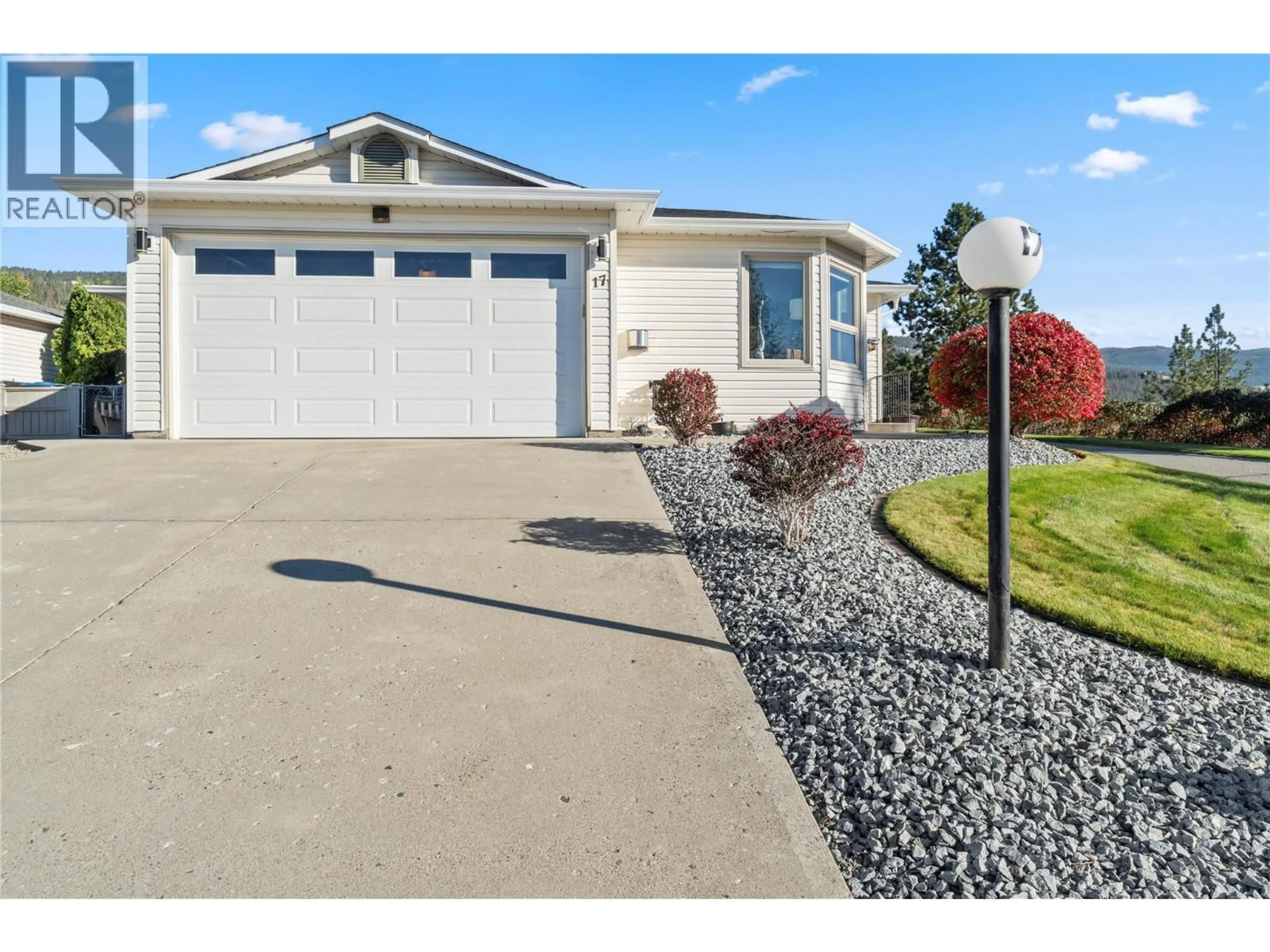 Home with vinyl exterior material, street for 17 - 6400 SPENCER ROAD, Kelowna British Columbia V1X7T6
