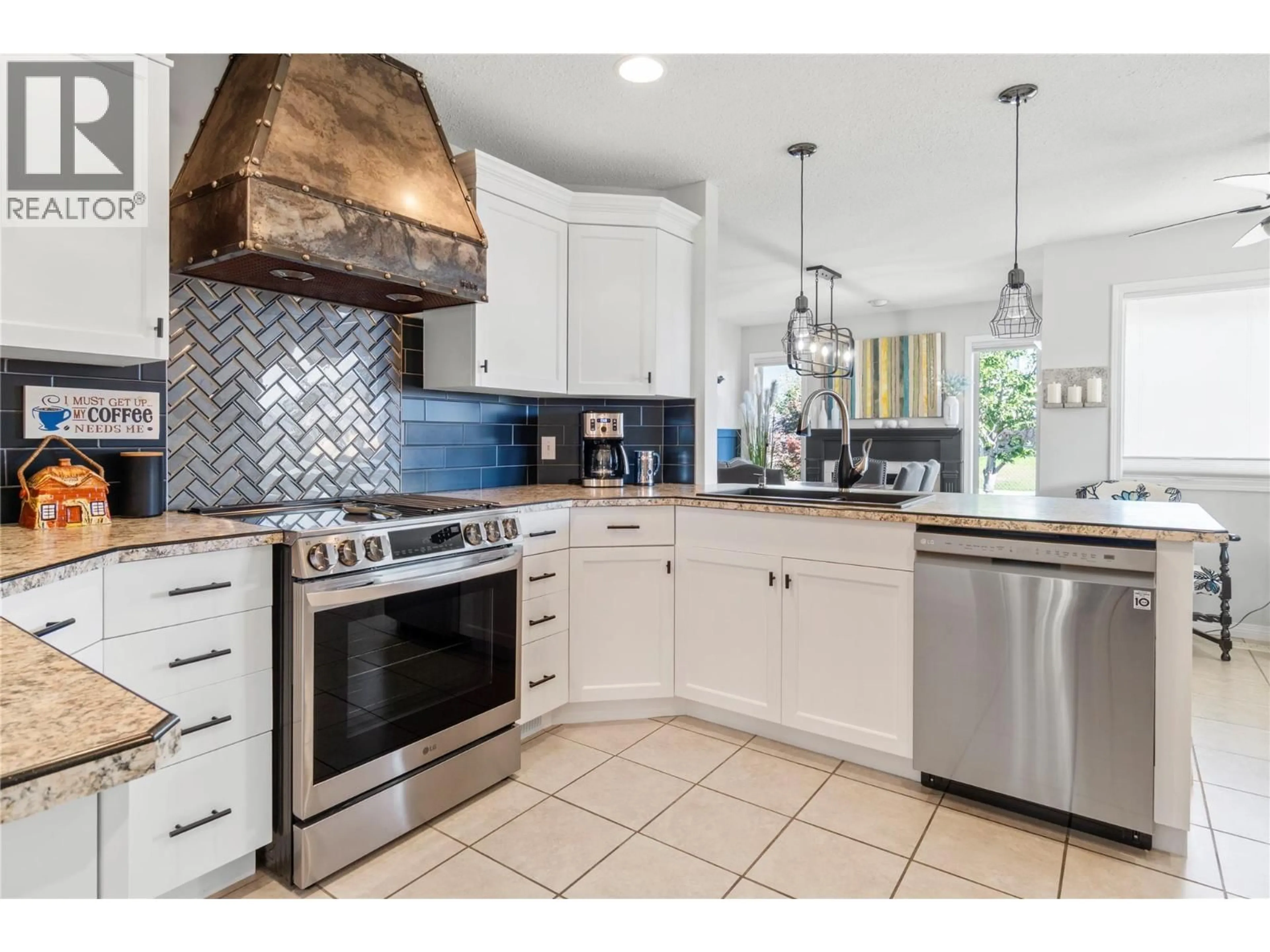 Open concept kitchen, ceramic/tile floor for 17 - 6400 SPENCER ROAD, Kelowna British Columbia V1X7T6