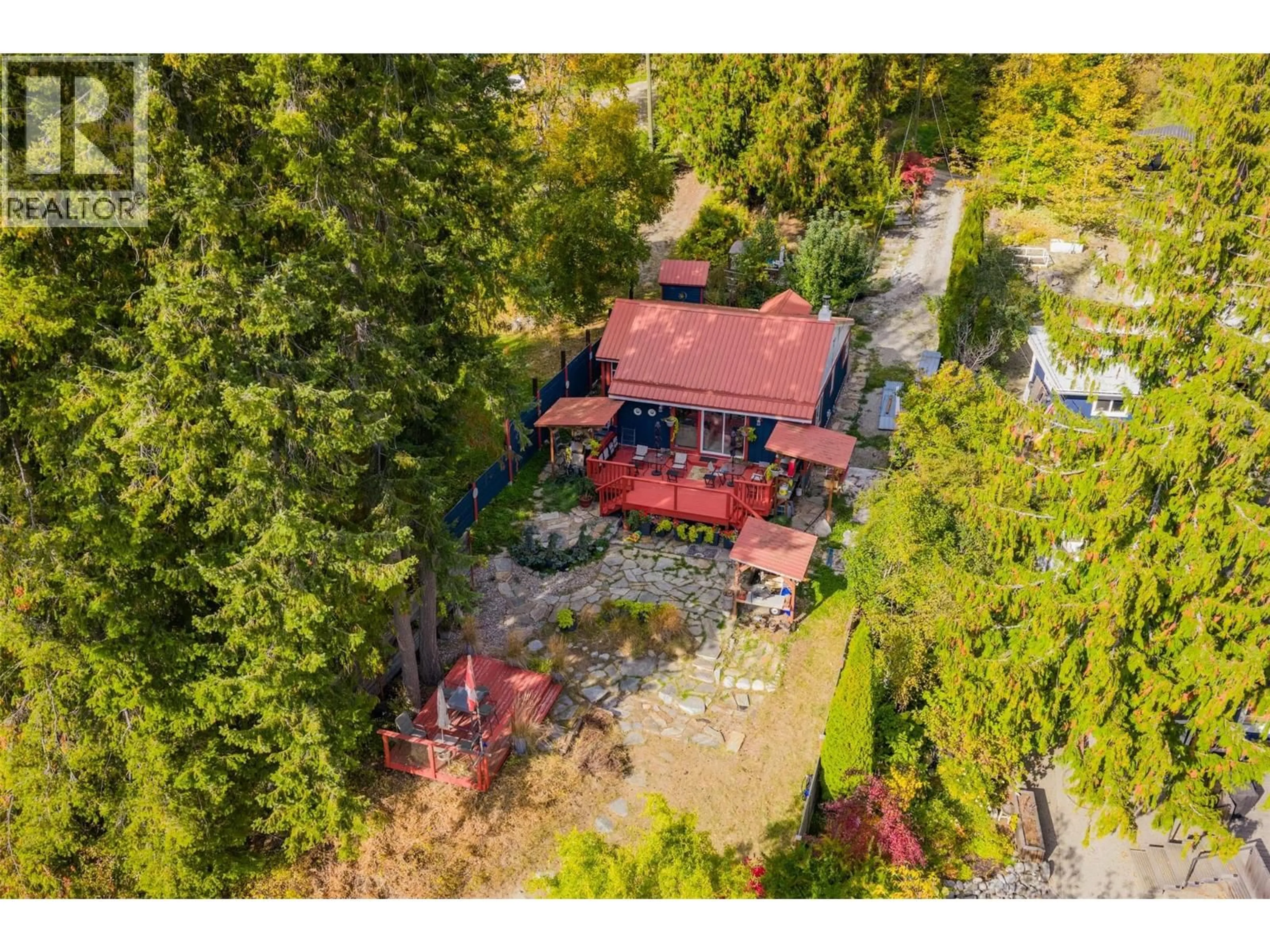 A pic from outside/outdoor area/front of a property/back of a property/a pic from drone, street for 7460 HIGHWAY 3A OTHER, Balfour British Columbia V1L7E9