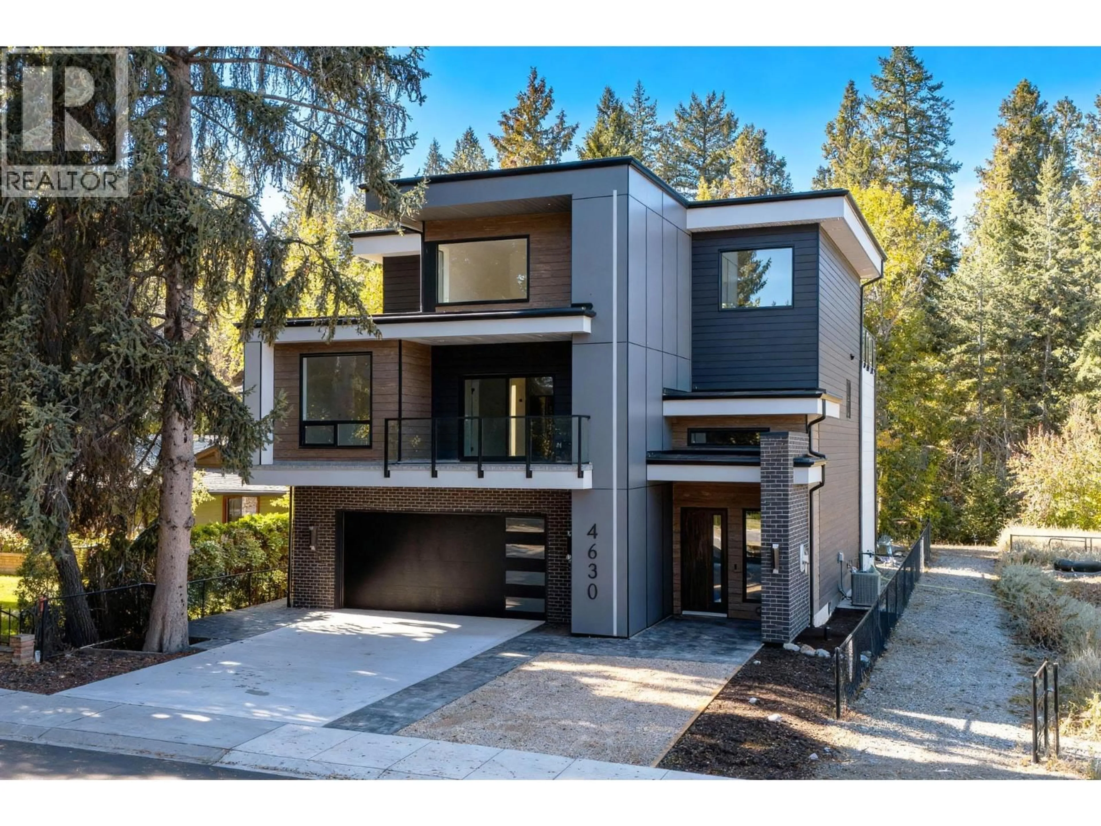 Home with brick exterior material, street for 4630 MCCLURE ROAD, Kelowna British Columbia V1W1L6