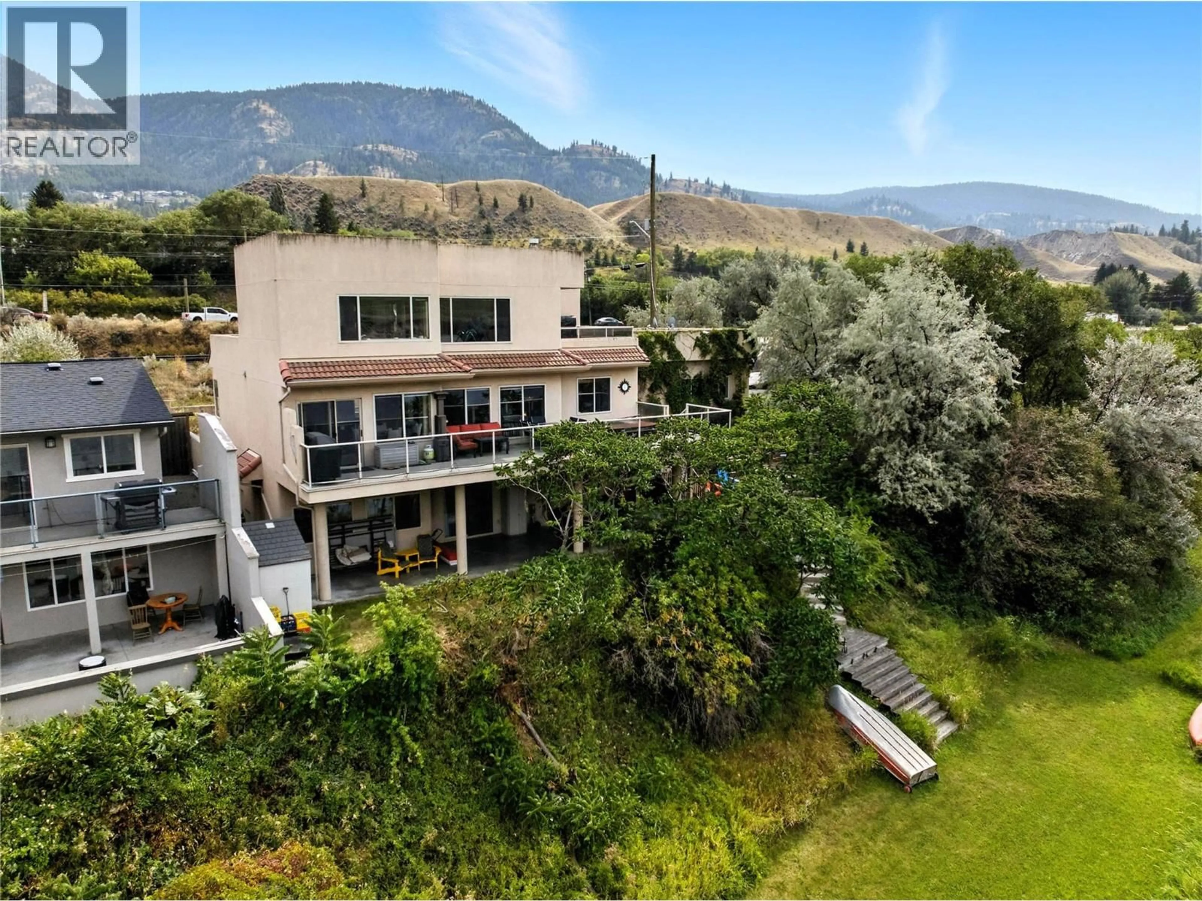 A pic from outside/outdoor area/front of a property/back of a property/a pic from drone, mountain view for 4990 KIPP ROAD, Kamloops British Columbia V2C4T2