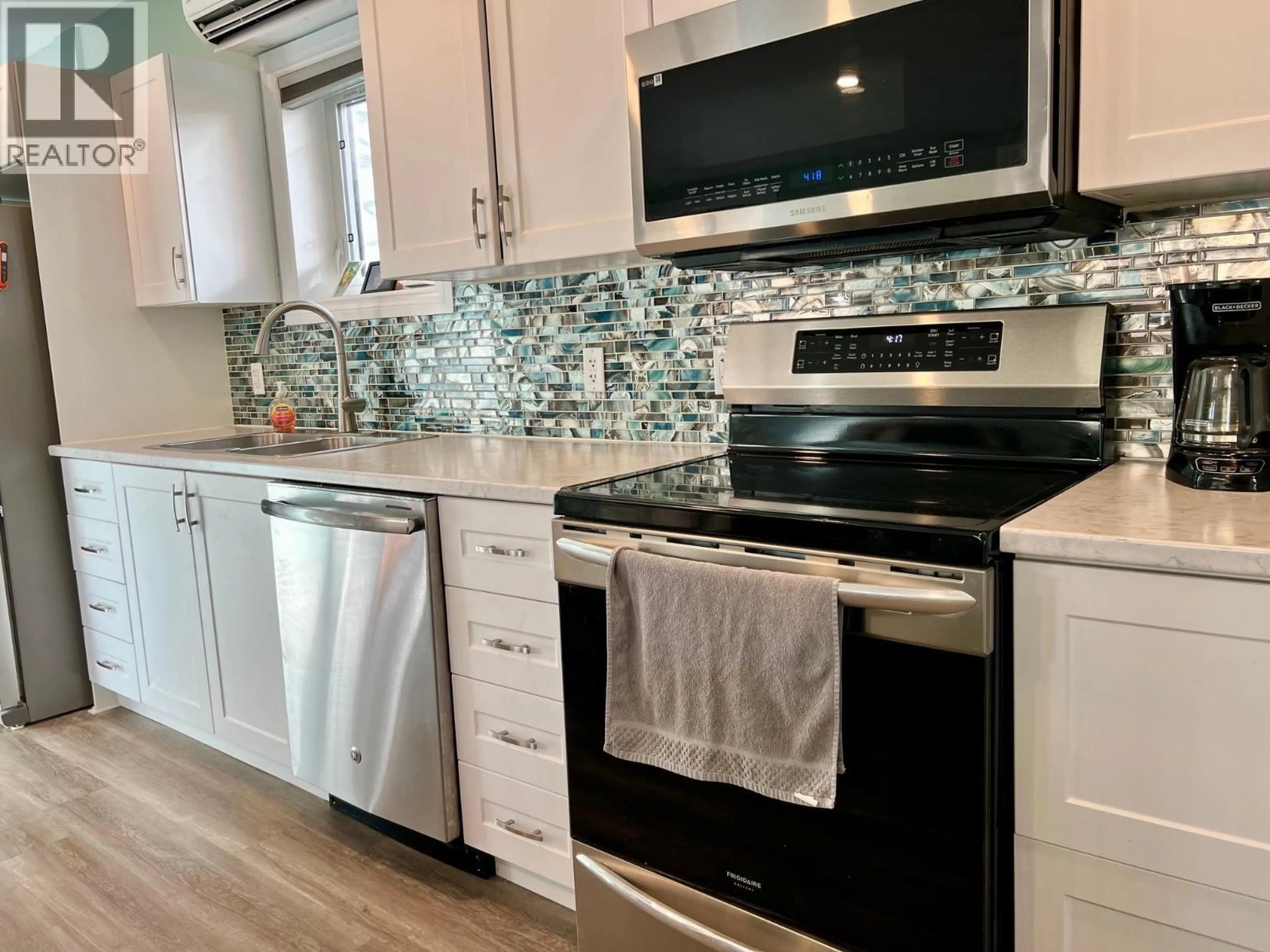 Open concept kitchen, ceramic/tile floor for 708 PINE STREET, Creston British Columbia V0B1G3