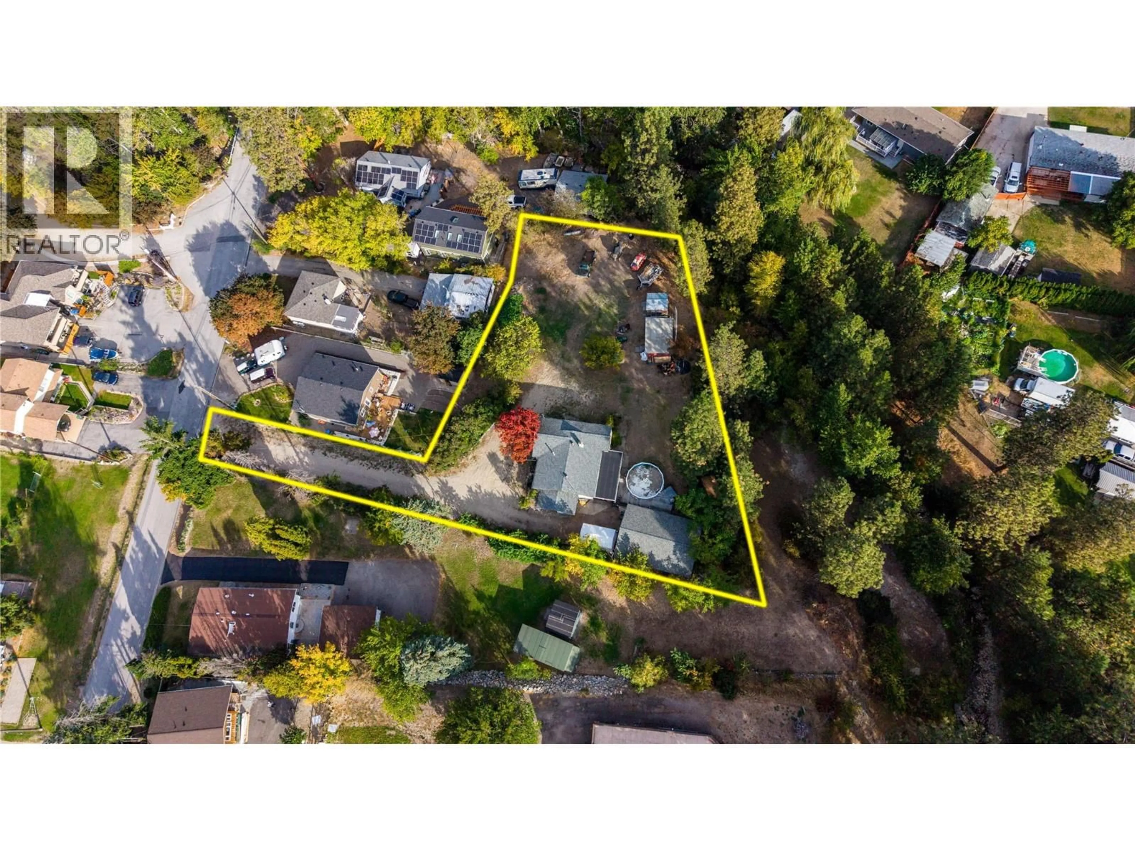 A pic from outside/outdoor area/front of a property/back of a property/a pic from drone, street for 1155 MAPLE STREET, Okanagan Falls British Columbia V0H1R0