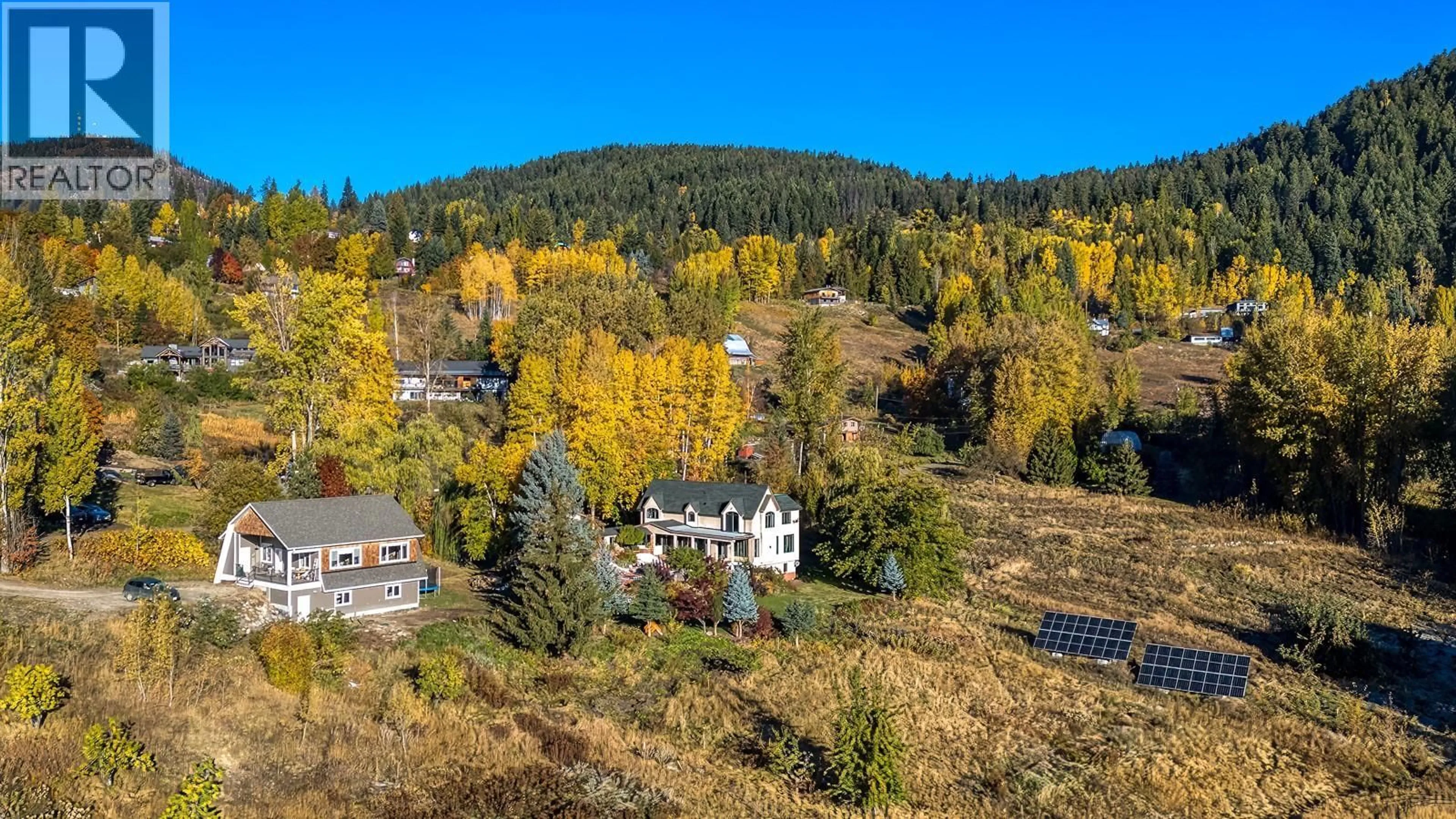 A pic from outside/outdoor area/front of a property/back of a property/a pic from drone, mountain view for 2302 HAPPY VALLEY ROAD, Rossland British Columbia V0G1Y0