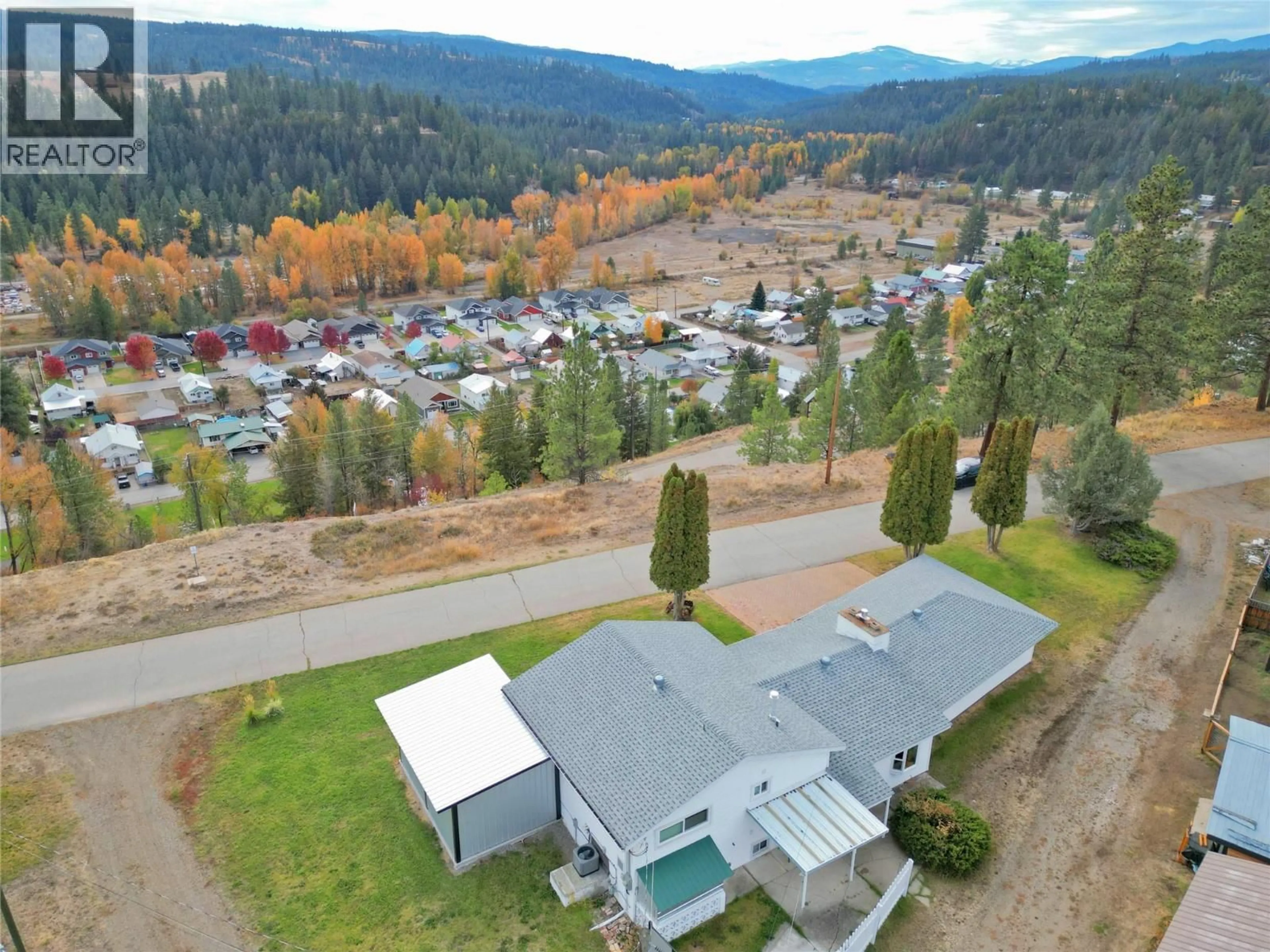 A pic from outside/outdoor area/front of a property/back of a property/a pic from drone, mountain view for 437 PARSONS AVENUE, Princeton British Columbia V0X1W0