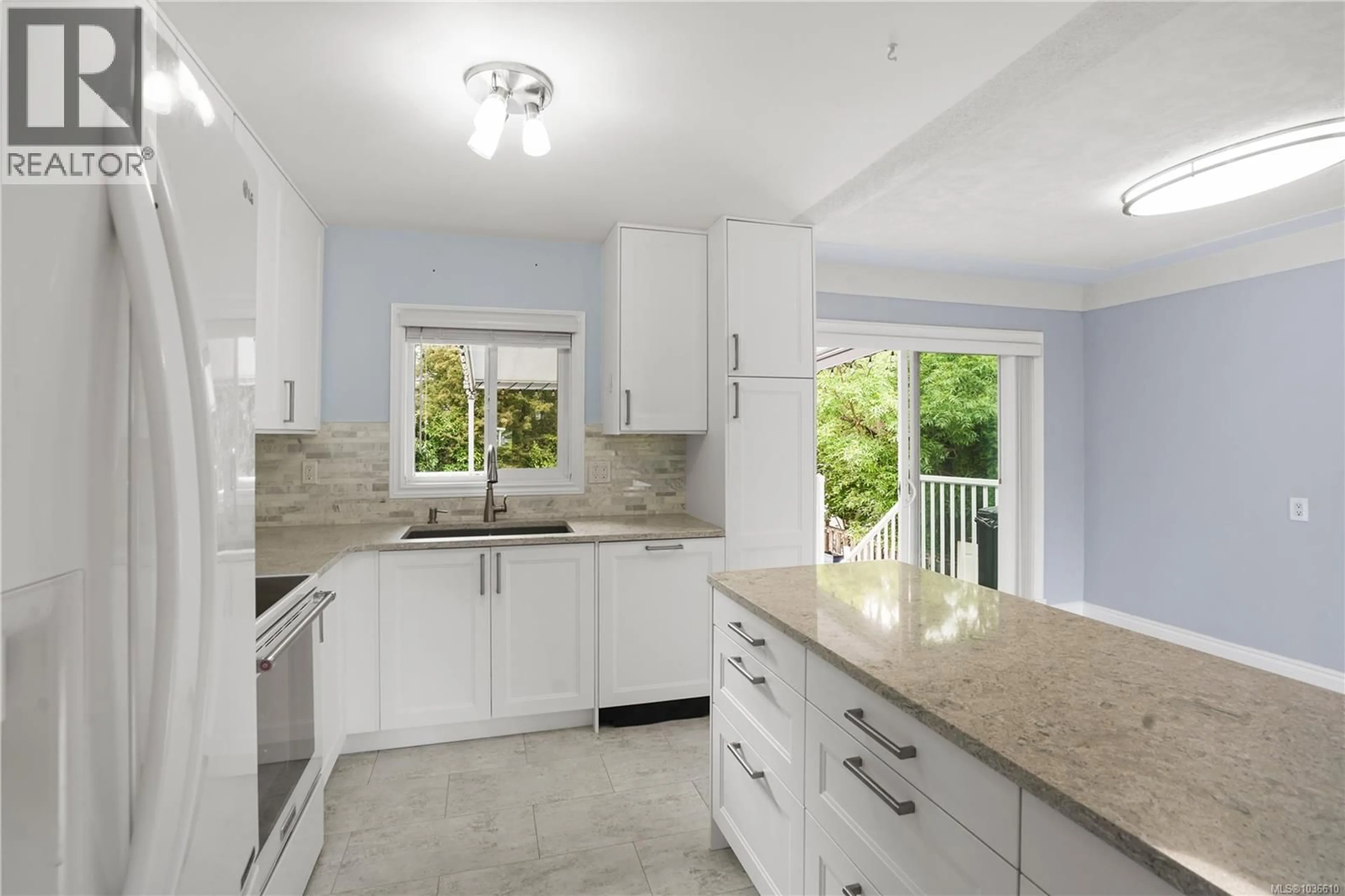 Open concept kitchen, ceramic/tile floor for 3922 ANTON STREET, Saanich British Columbia V8Z4M3