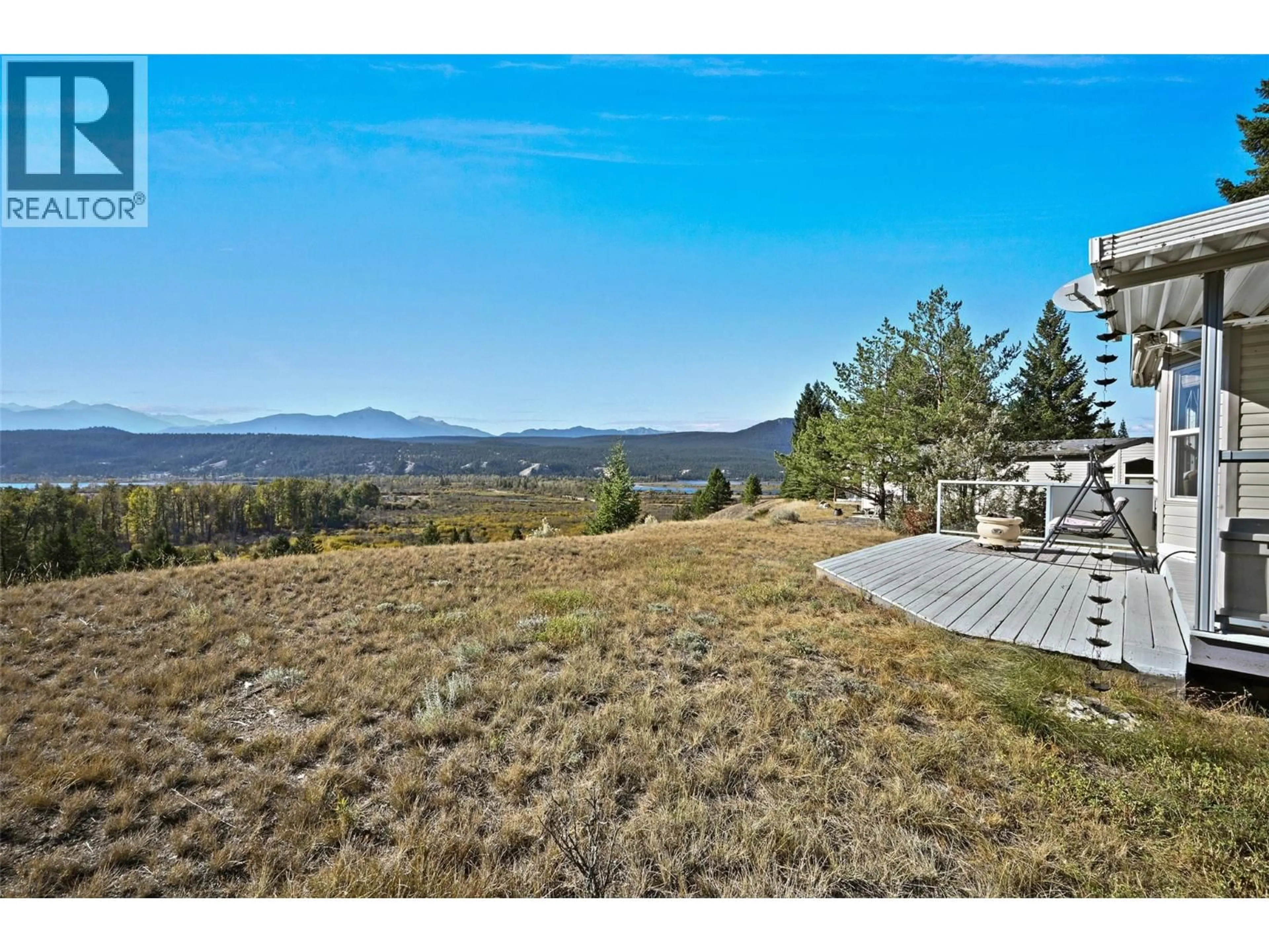 A pic from outside/outdoor area/front of a property/back of a property/a pic from drone, mountain view for 4877 LYNX DRIVE, Radium Hot Springs British Columbia V0B2L0
