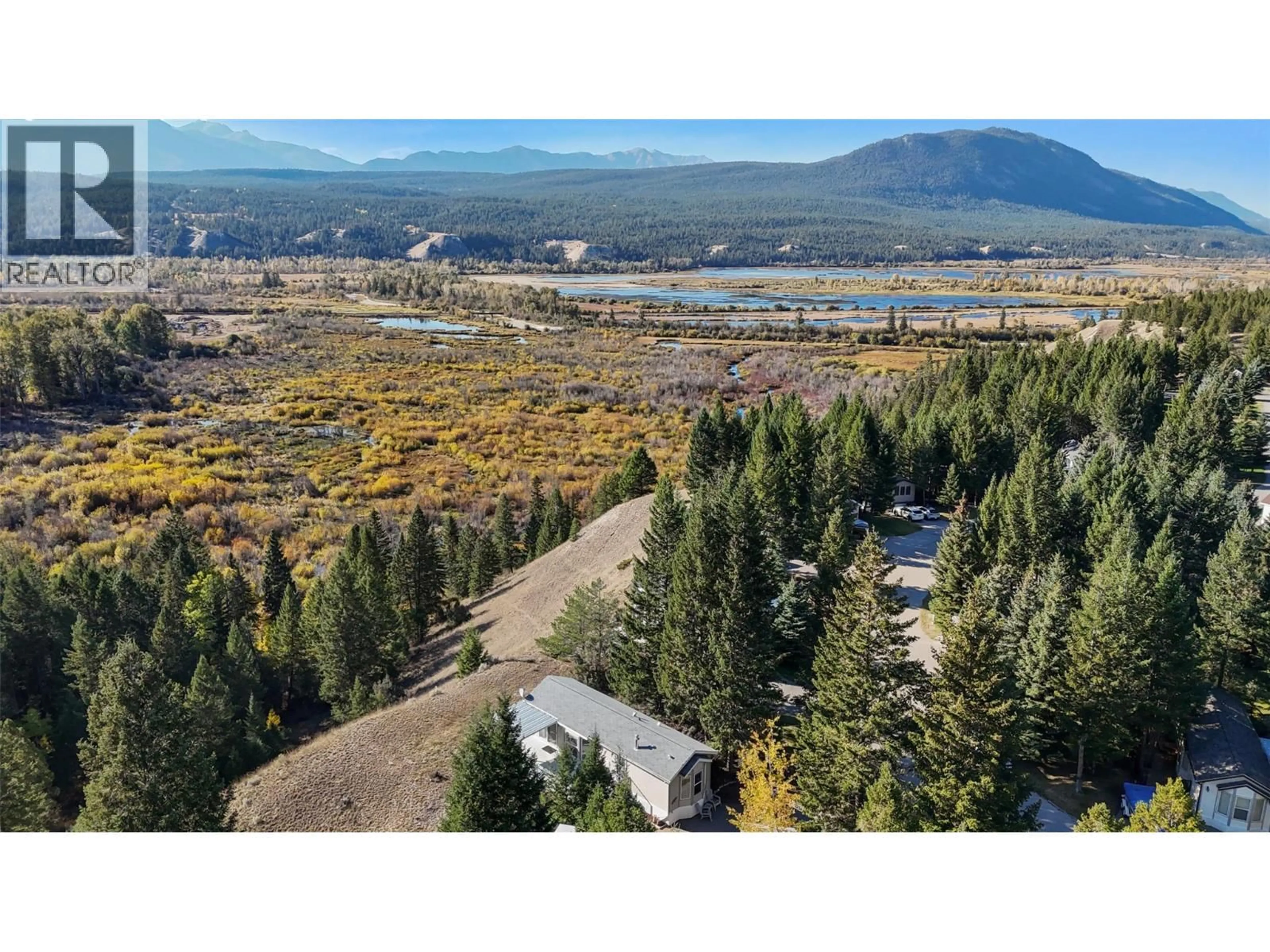 A pic from outside/outdoor area/front of a property/back of a property/a pic from drone, mountain view for 4877 LYNX DRIVE, Radium Hot Springs British Columbia V0B2L0
