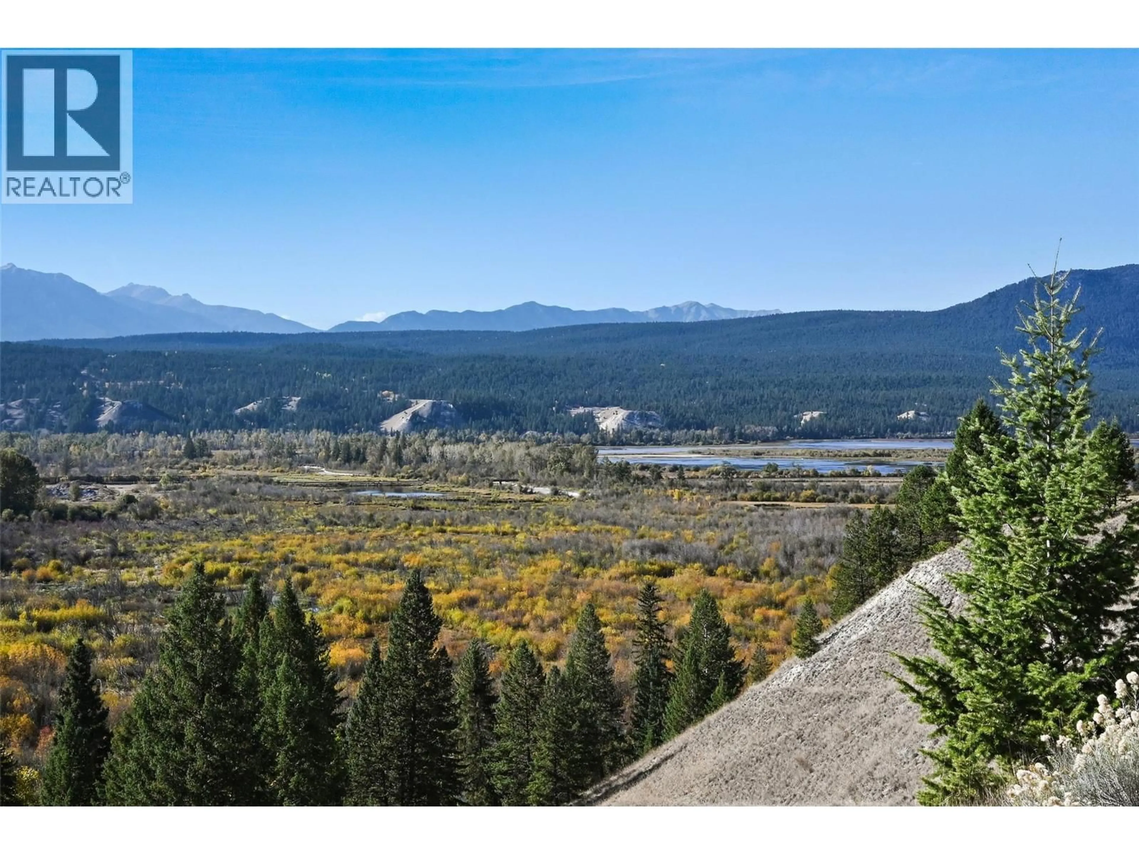 A pic from outside/outdoor area/front of a property/back of a property/a pic from drone, mountain view for 4877 LYNX DRIVE, Radium Hot Springs British Columbia V0B2L0