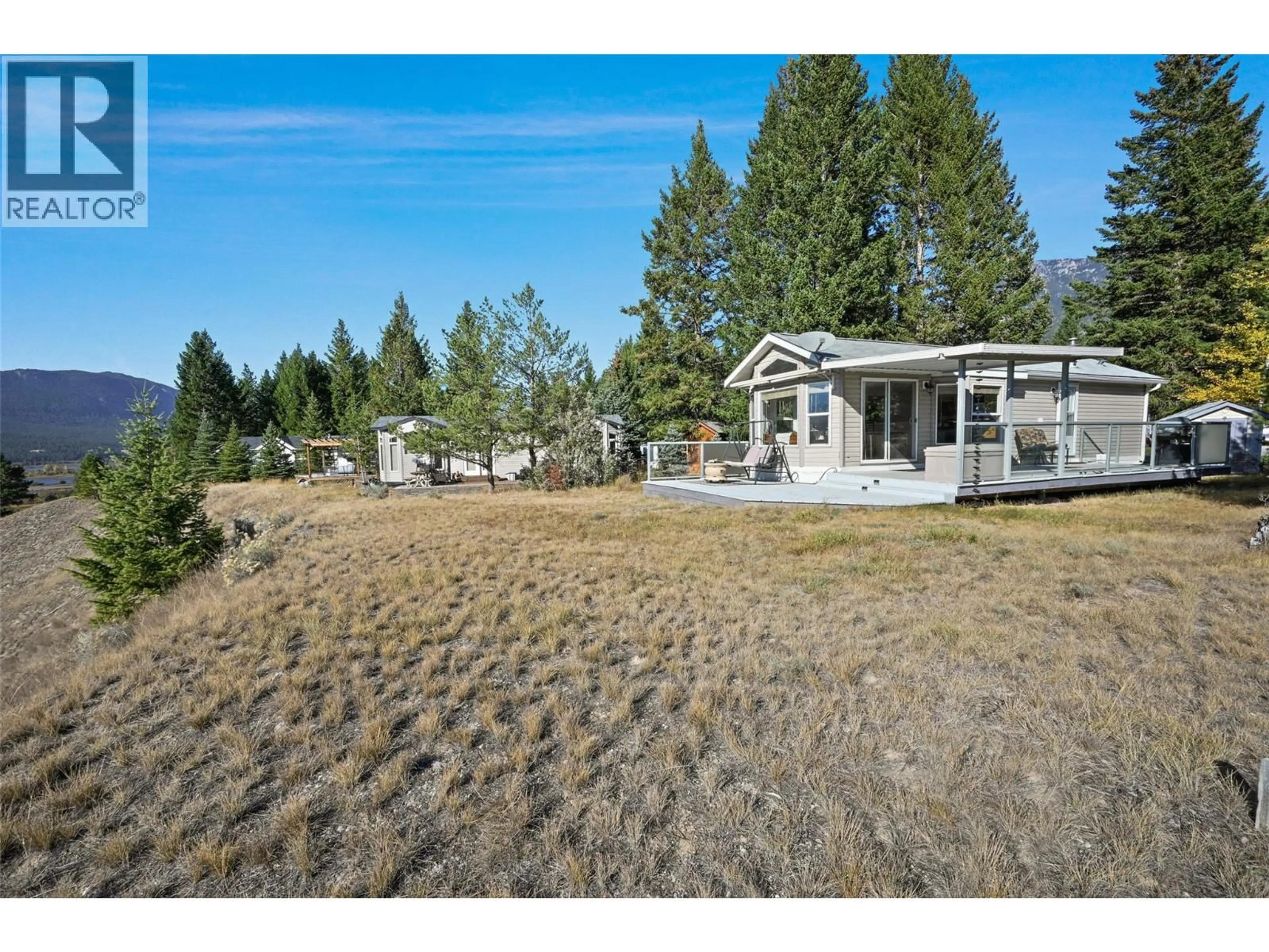 A pic from outside/outdoor area/front of a property/back of a property/a pic from drone, mountain view for 4877 LYNX DRIVE, Radium Hot Springs British Columbia V0B2L0